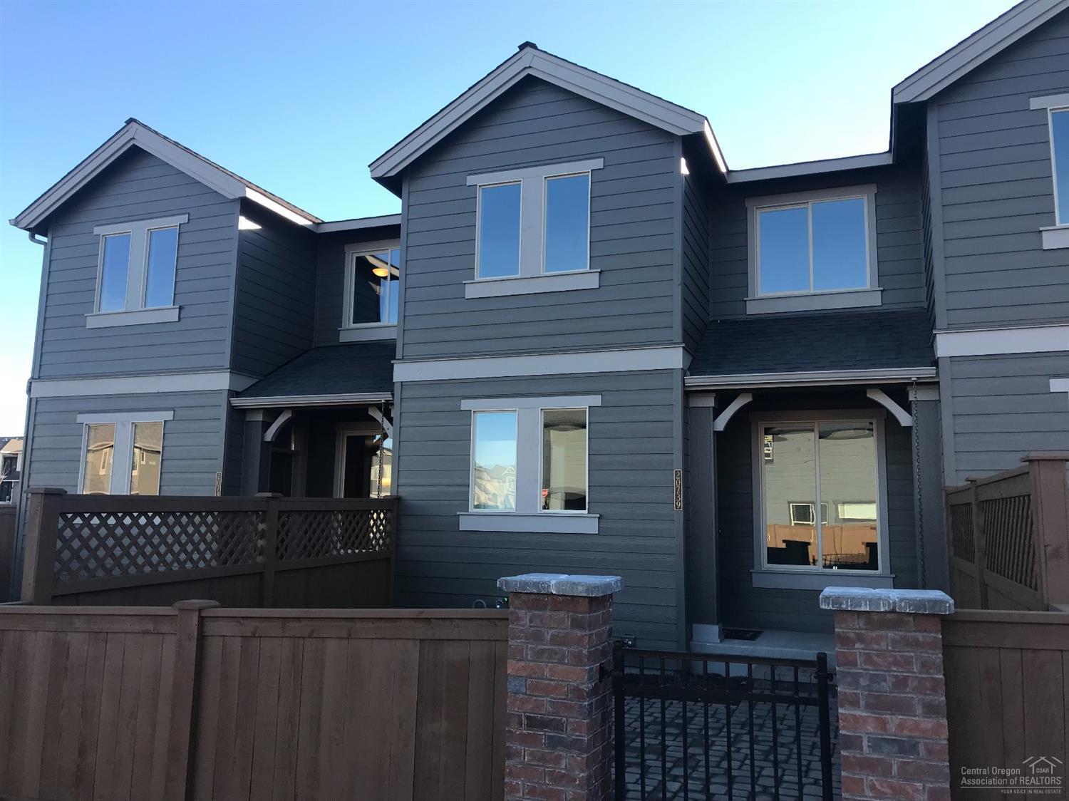 Brand new Parkside townhome w/ the quality Pahlisch Homes is known for, stainless steel appliances, laminate wood flooring, Quartz counters w/ under-mount sinks and much more. Home features 3 bedrooms, 2.5 baths & a loft that makes a great play room, additional living area or office. Home feels much larger than 1450 SF. This will be a low maintenance townhome, would make a great second home. PARKSIDE 2-A-1450-2 (Middle unit) Model home is at 20727 Boulderfield Ave. Opened Thurs-Sun. 12-4