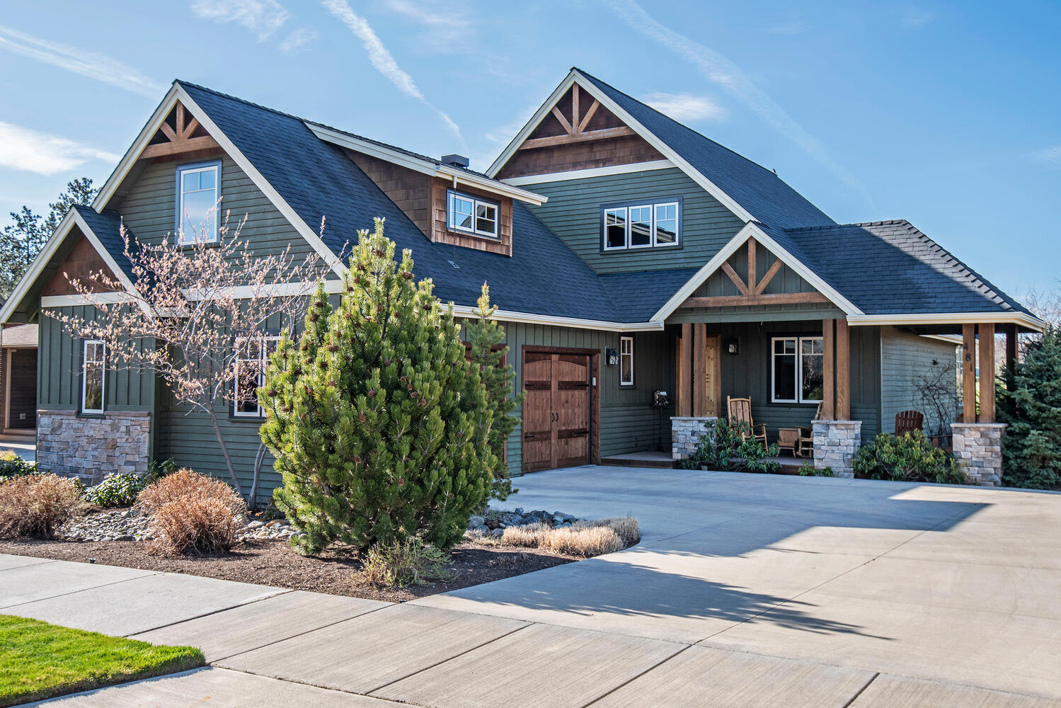 Behold stunning Cascade Mountain Views of the Three Sisters, Broken Top, and Tam McArthur Rim from this spectacular home in Sisters, Oregon! This high-quality custom Craftsman boasts an open floor plan, floor-to-ceiling windows, a stacked stone fireplace, distressed wood floors in the great room, and wood-cased windows throughout. Cook's Kitchen has handmade cabinets, granite countertops, a breakfast bar, and a pantry. The spacious primary suite has huge mountain views, a double vanity, a soaking tub, a men's commode, and a walk-in closet that passes through to the laundry area. The main level also boasts a 2nd guest bedroom, an office, and a mudroom. Upstairs is a loft/bonus area, plus a bunk room and full bath. The 2-bay garage has a workbench, 220v, ample space to store your outdoor gear, plus a central vacuum system. Pine Meadow Village within the heart of Sisters has a clubhouse, pool, hot tub, and tennis courts, and is less than half a mile from shopping, restaurants, and events!