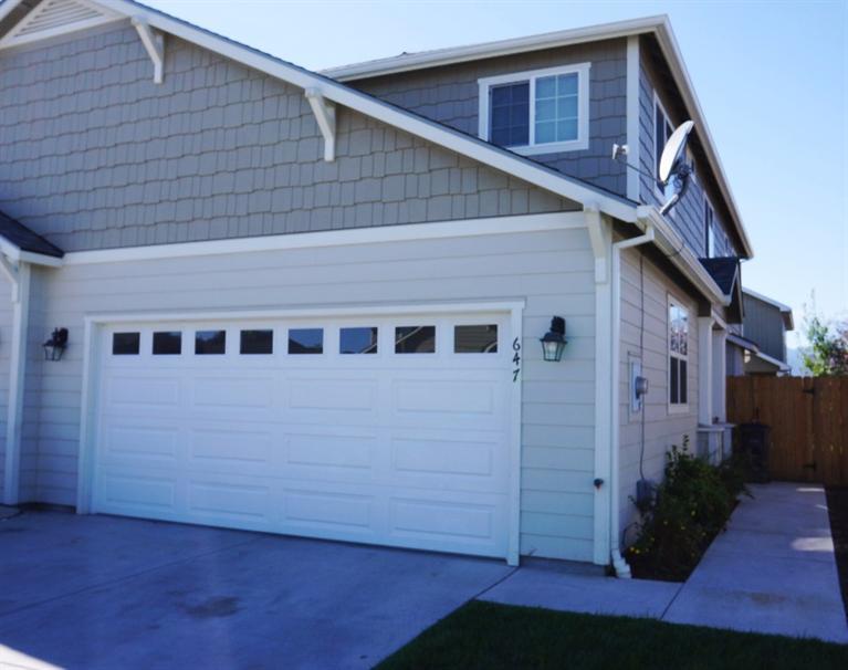 Super nice home with a modern feel inside! The 3 bedroom 2 1/2 bath home built in 2011 boasts 1774 Sqft! This home comes with all appliances including the fridge and washer/dryer - Truly turn key and ready to move-in! Granite counter-tops - stainless steel appliances - gas fireplace - large bedroom - 2 car finished garage with fenced yard and sprinkler system. Priced to sell! A must see!