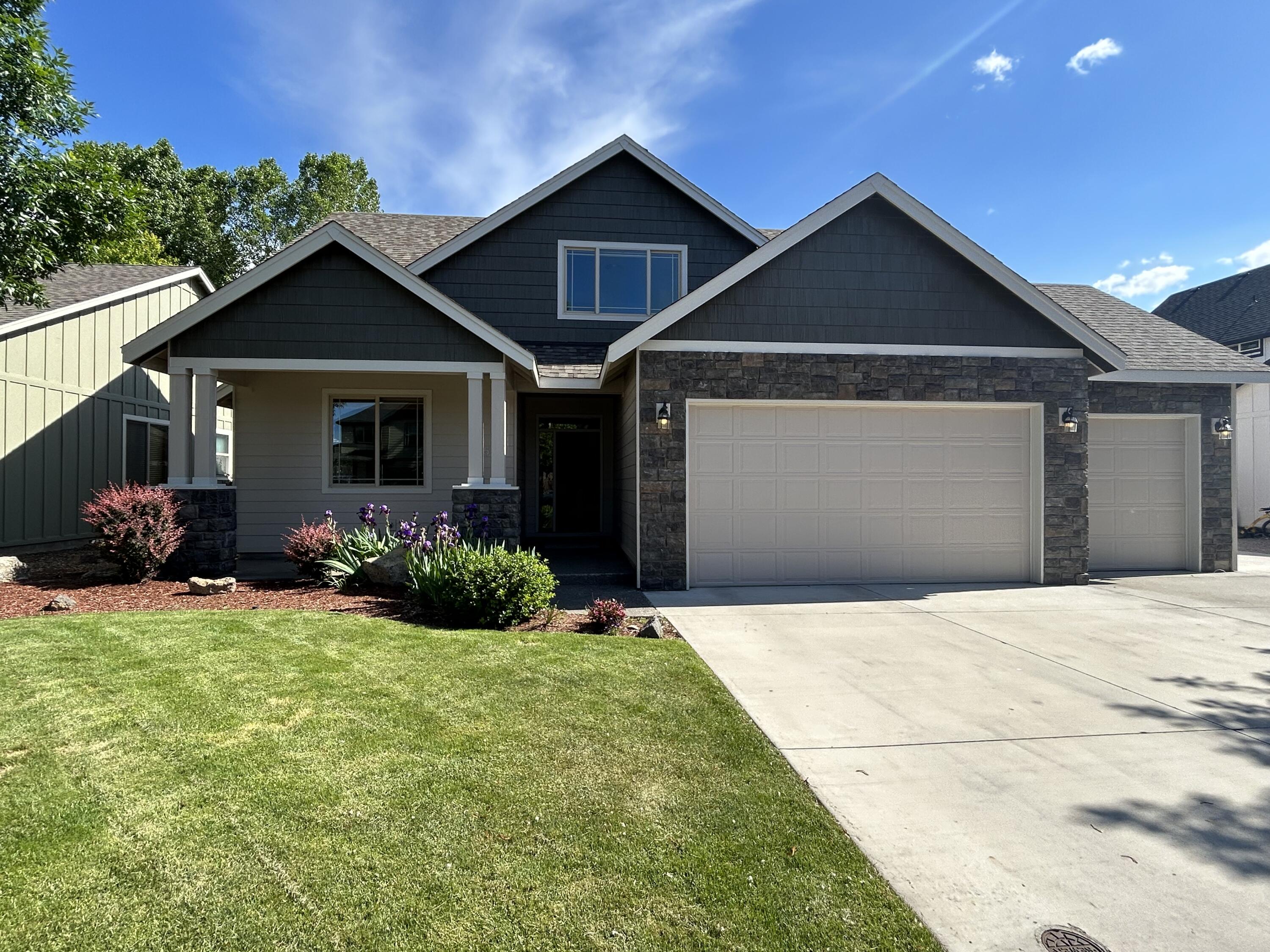 BRAND NEW exterior & interior paint, carpet and appliances! Vacant and turn-key in preferred NW neighborhood, 2 blocks from schools and short distance to canyon trail access & Quince Park. Large .2 acre lot with spacious backyard w/ approx. 17' x 17' shop. Primary on the main w/ walk-in closet, double vanity & soaking tub. 3 bdrms upstairs w/ full bath. Slate entryway to great room w/ gas fireplace w/ tile surround feels extra spacious with extended height windows & cabinets. Kitchen includes new oven/range, dishwasher & microwave. Tile backsplash and large/deep cabinets. Entertain at the extended counter/bkfst bar opening to dining area and great room. 9' vaulted ceilings. Triple-car garage w/ built-in shelves. Enlarged covered back patio w/ extensive cement path to RV/boat parking w/ gate. Mature trees & designated garden area too. A/C included. Upgraded faux wood blinds and wood trim throughout.