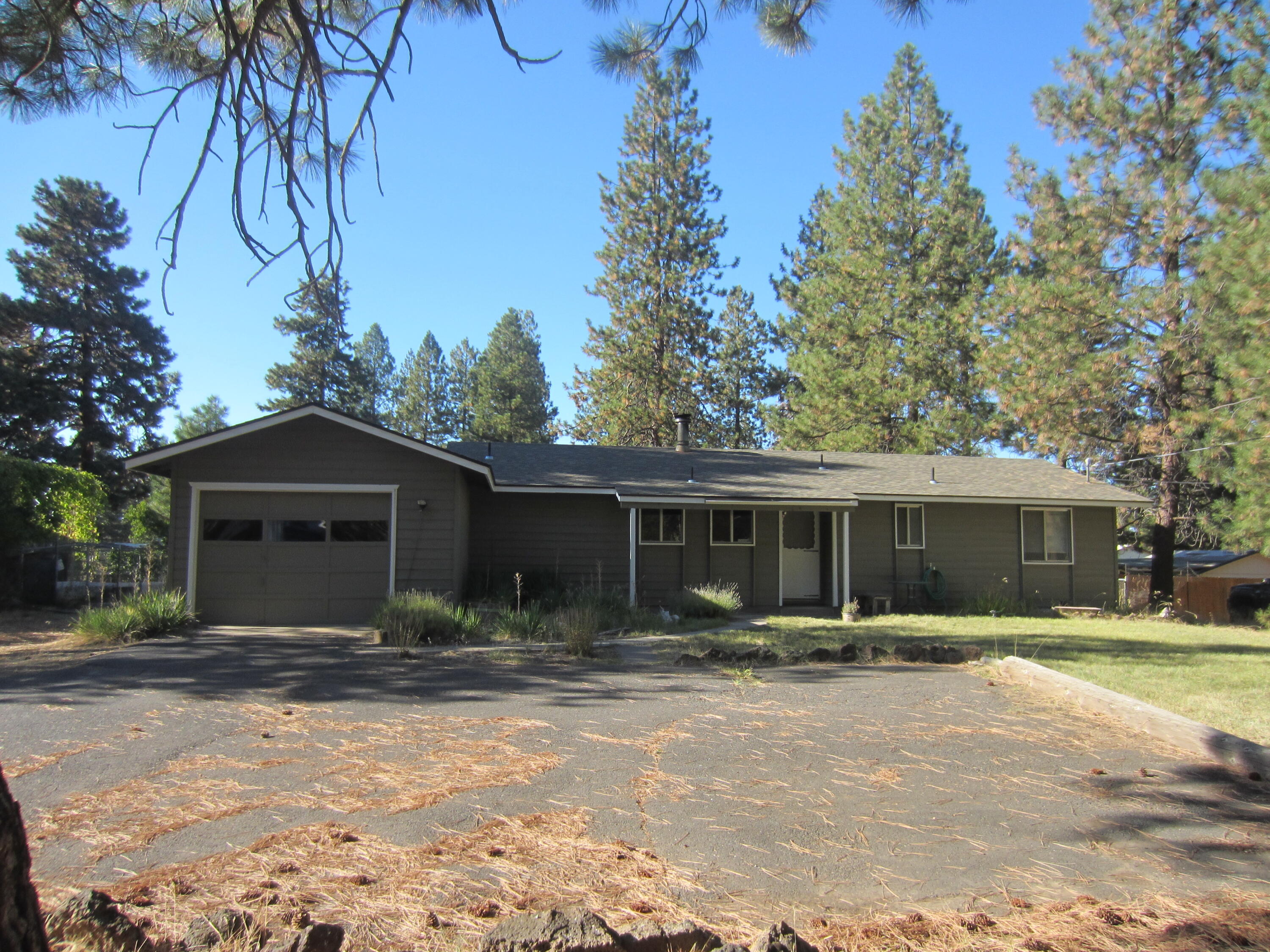 Single level close in. Electric forced air furnace. .88 Acre flat fenced lot. Newer roof and exterior paint. 1 car garage. Storage unit. Paved road. RV parking. Room to build a shop. Horses allowed.