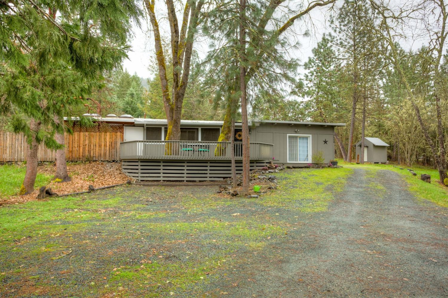 Your dreams may come true with this wonderful 3 bedrooms, 2 bath home. Ready for the gardener, 4h'r or just enjoyment of space. Almost 2 acres with a pasture, seasonal creek and a cover for your animals. Home has fresh paint, new deck, fenced yard space for kids or animals. Open floor plan with separate master bedroom, laundry room and a sun room to relax in during those hot summer nights without bugs. Both bathrooms have been redone within last two years.
