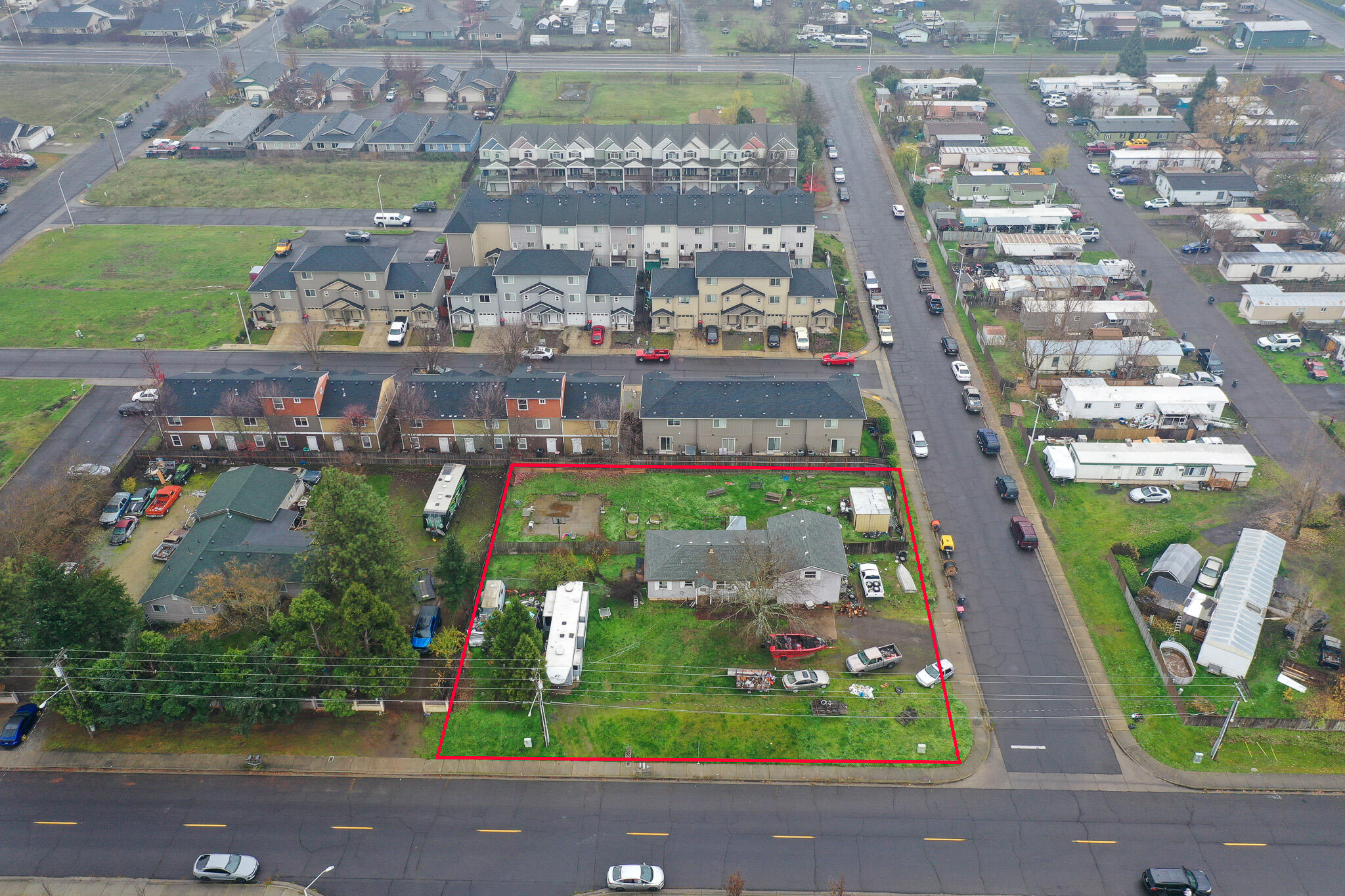 Investors! This corner lot is .45 acres and it is zoned WCUR-30. Surrounded by four-plexes and multi family. Great location on Avenue C. Value is in the land