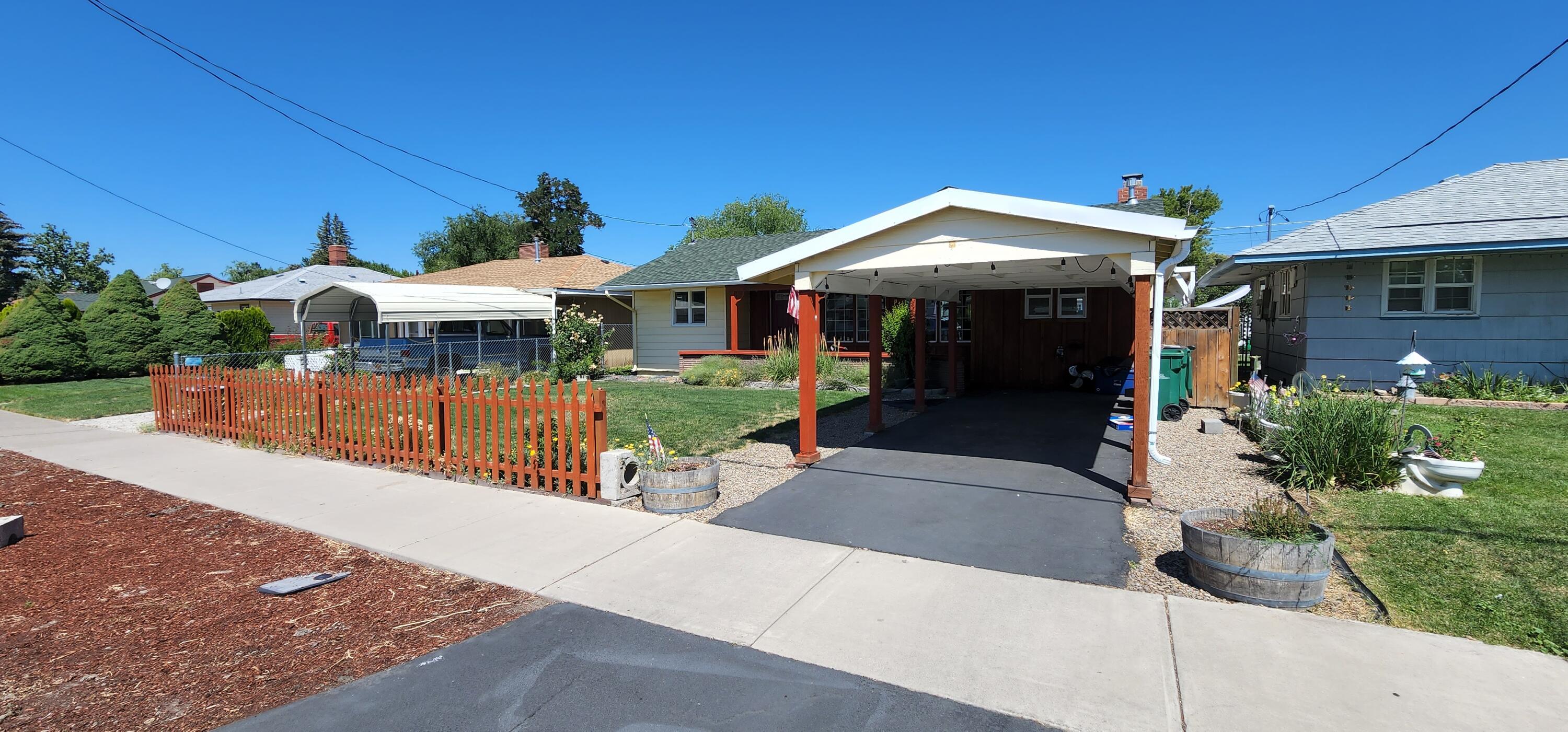 This recently updated home is move-in ready and waiting for its new owners! Offering over 1,100 sq. ft., this 3-bedroom home features a cozy living room with a free-standing gas stove, a comfortable covered patio, and a fully fenced yard—perfect for relaxing or entertaining. The property is currently occupied by a long-term tenant who would like to remain, making this an excellent opportunity for investors seeking immediate rental income. Don't miss the opportunity to make this home yours—call today for more details!