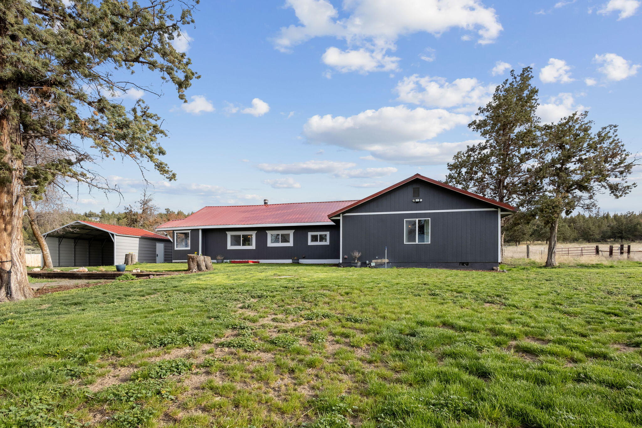 Updated farmhouse on 20 acres at the end of a quiet road just minutes to Prineville Reservoir & backs to BLM land. This darling cottage has been updated w/ flooring, paint, tile, new bathroom, barn doors, windows, light fixtures, & all new appliances.  Enter into great room w/living, dining, & kitchen. Woodstove to heat the house. Painted cabinets, tile counters & bright natural light finish off the farm style kitchen.
Down the hall are 2 bedrooms (1 w/private outside entrance). Lg laundry room, newly remodeled bathroom & primary bedroom on the other wing of the house.
Primary is huge; 2 closets, attached bath, & room for office/gym. Outside is 20 acres of fenced pastures set up for horses, cows w/ multiple frost free spigots & electrical for tank warmers. No
CCRs or HOA! Machine barn w/hay storage, outdoor arena area, new septic system, pump house & private well. Check w/county about subdividing.