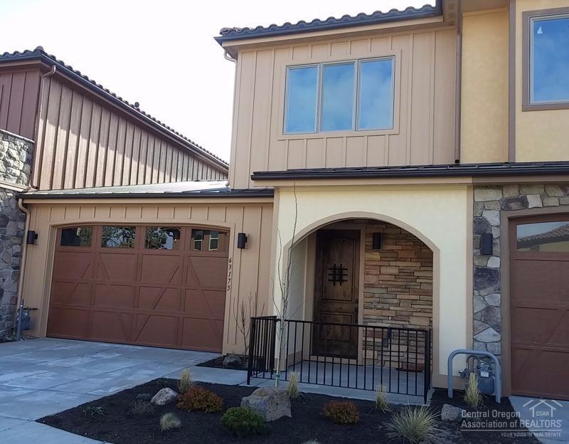 New Luxury town home in fabulous Tuscany Pines exclusive west side addition. Main level master. Tuscan style with tile and metal roof, stucco/wood exterior, stone and wrought iron accents. 10 ft ceilings, solid wood doors and trim, hand textured walls, GE Monogram appliances including 5 burner cook top. Quartz counters throughout, hardwood floors, tiled master shower, 2 car garage and more. HOA dues provide beautiful community pool, clubhouse, and gym and exterior maintenance and insurance.