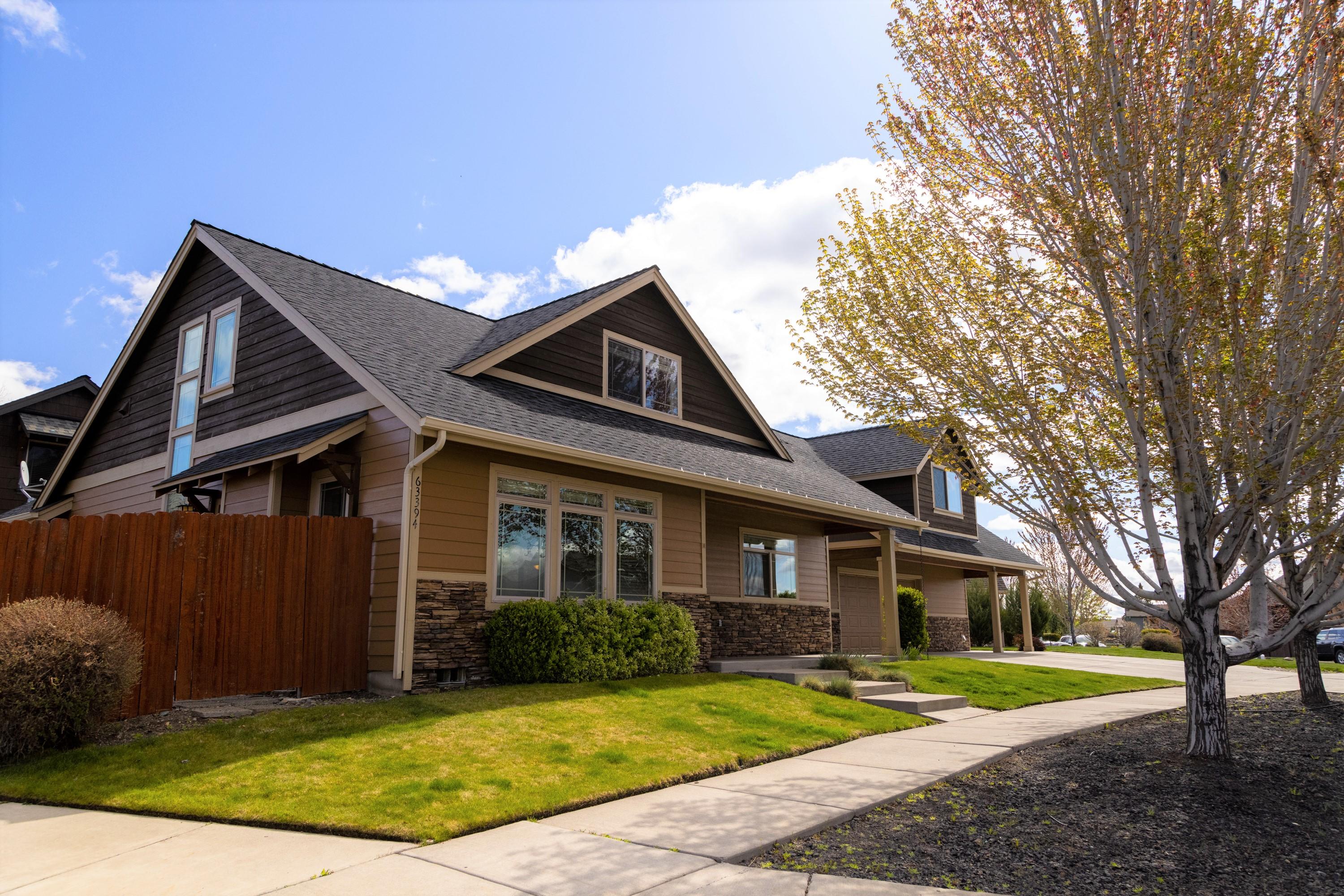 3 bed/2.5 bath home with a detached 470 sq ft 1 bed/bath ADU in the lovely Barton Crossing neighborhood with Cascade Mt. Views. Terrific opportunity for rental income with the ADU and tenant in place.  Main house has a spacious kitchen and dining area with a breakfast bar, granite countertops, and SS appliances.  Living room has floor to ceiling stone gas fireplace and access to the backyard.  Master bedroom is on the main floor with two bedrooms up and a bonus room.  Fenced backyard with separate patio area.  Property is currently eligible for a STR permit per City of Bend STR map. You'll love the convenience of shopping and restaurants close by and the 36 acre Rockridge Park that's blocks away.
