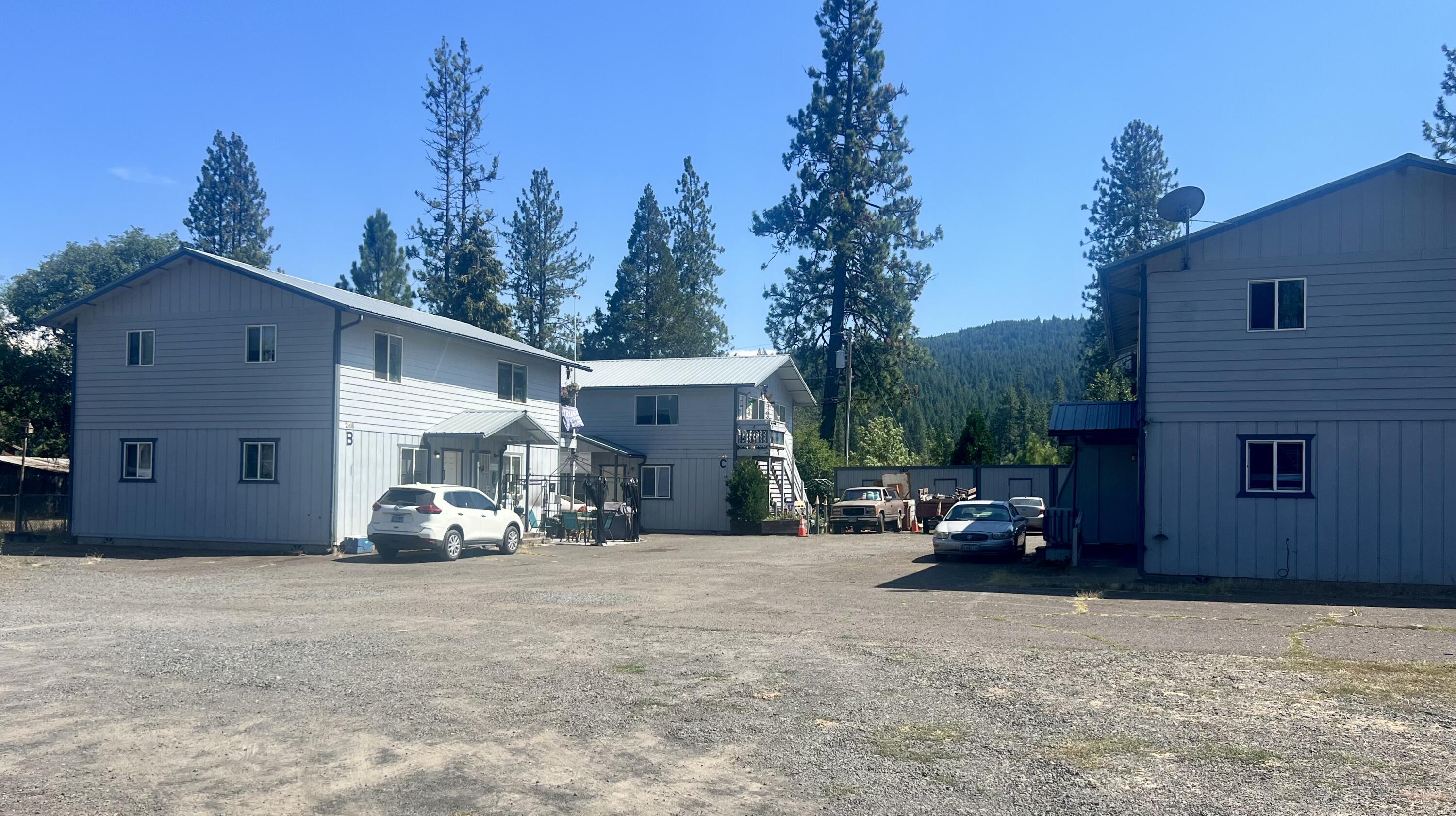 Well-maintained 9-unit multifamily property in the heart of Butte Falls. Built in 2002, totaling ±6,200 SF across three two-story buildings on an ±18,730 SF lot. Units are 2-bedroom/1-bath, each with separate gas and power meters. The complex is composed of 3 buildings with 3 two bedroom and six one bedroom units. All units have a storage shed.  Large open parking area. Professionally managed with 8 of 9 units occupied; several tenants have been in place for over a decade, reflecting strong retention.  No HOA fees. Located in a quiet rural setting with access to local services, schools, and outdoor recreation, this property provides stable income and room for future rent growth.