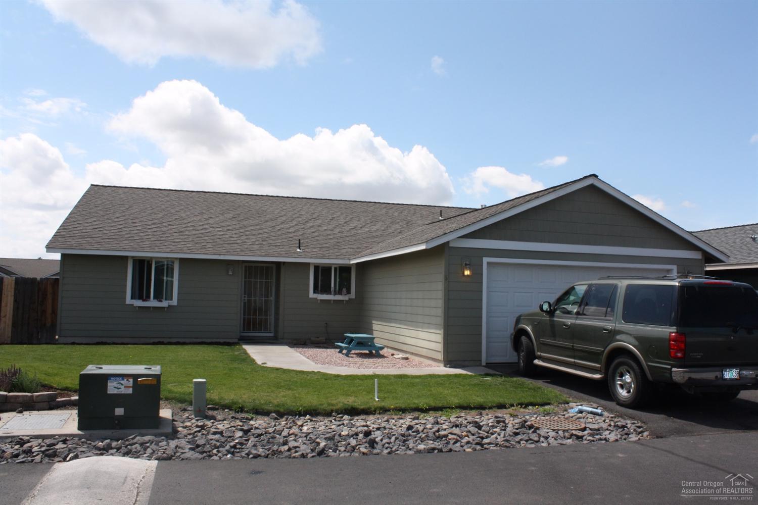 Awesome 4 bedroom 2 bathroom 1916 sq ft family home located on a large corner lot! Fenced backyard with separate fenced in garden area. Huge living room with vaulted ceiling, large kitchen and dining area, master bedroom separation with large walk in closet and the list goes on...This is a must see!!