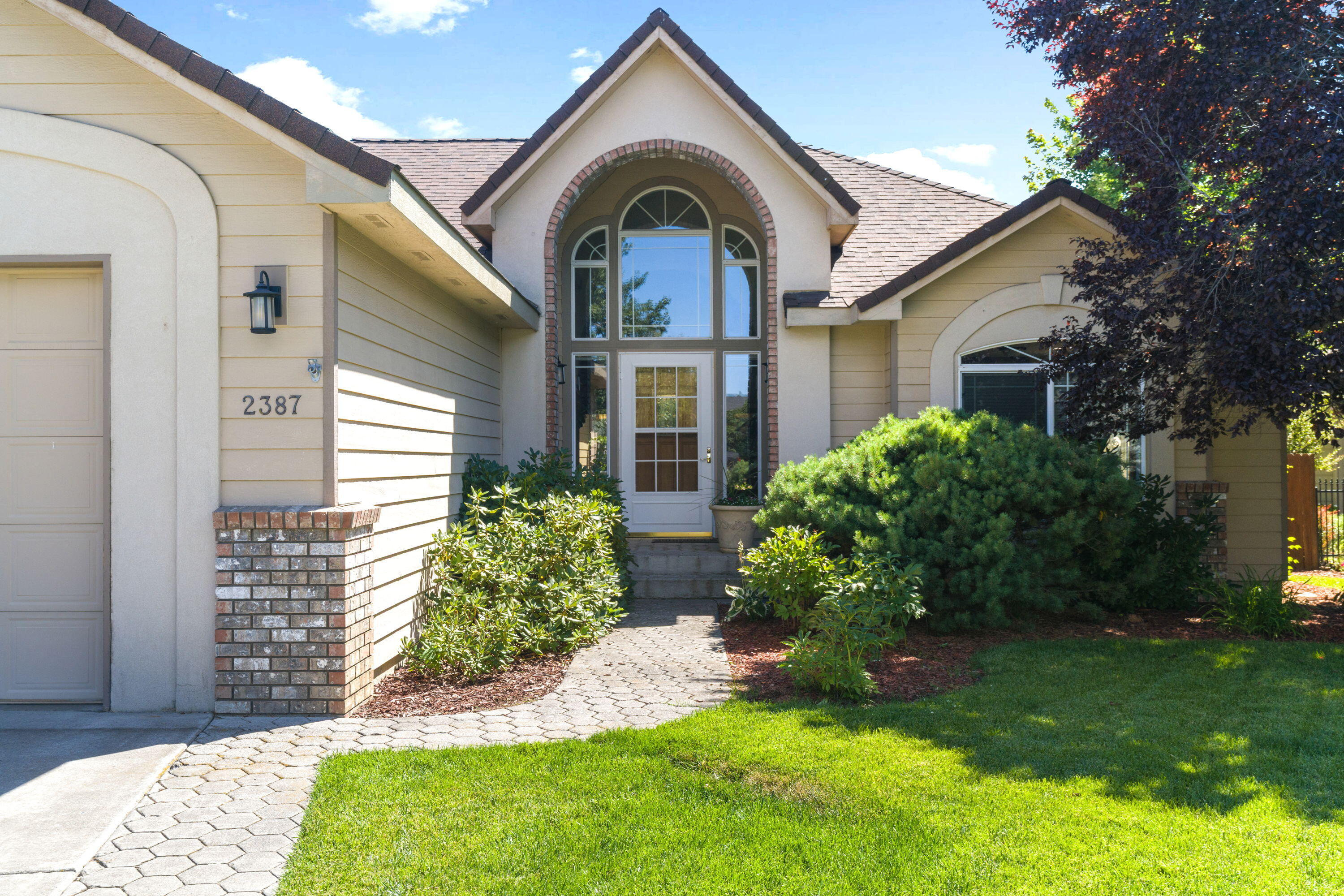 Imagine living in Stonebrook, a peaceful neighborhood where tree-lined streets lead you to Pine Nursery Park and all the best of Bend is just minutes away. This single-level, 3-bedroom, 2-bath home blends comfort and style with rich Pergo floors, granite counters, and a spacious primary suite with a cozy sitting area, jetted tub, and walk-in shower. Step outside to your private backyard oasis with tranquil lake views, open space, and a retractable awning are perfect for summer barbecues or quiet evenings at home. With recent updates like a new furnace (2019) and roof (2014), this home is ready for you to enjoy, whether you're raising a family, empty nesters or settling into retirement.