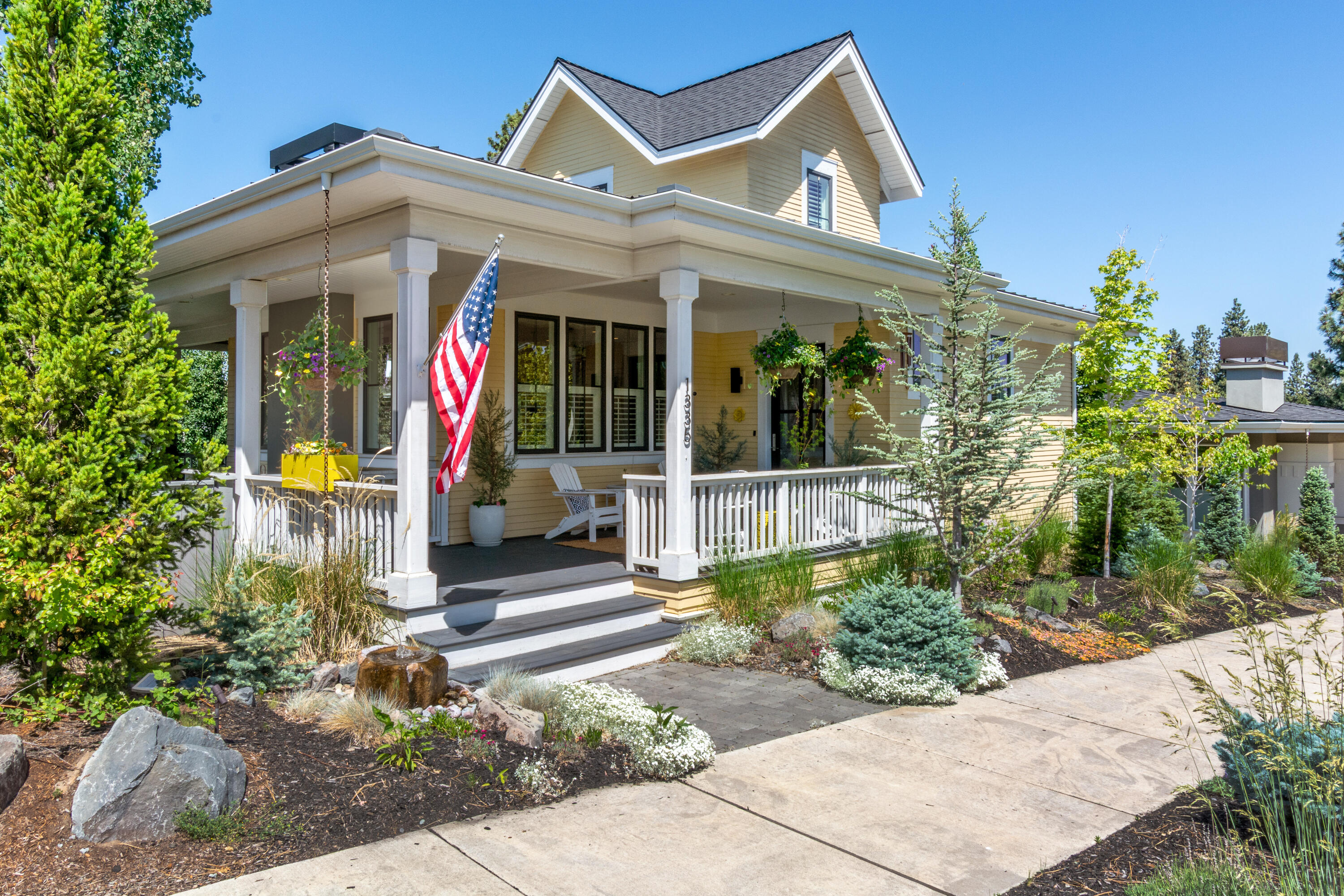 Located just two blocks from the Grove, this captivating home features 3 bedrooms, 3 baths, plus an office and flex space. Perfectly blending modern style with everyday comfort. From the moment you step inside, you're welcomed by rich wood floors that flow throughout the home, bright white finishes, and an abundance of natural light which highlights every thoughtful detail. The kitchen features sleek stainless steel appliances, including a Wolf range and Subzero refrigerator - ideal for entertaining. The spacious living room centers around a cozy fireplace, which creates a warm and welcoming atmosphere. The office offers a quiet place to work from home and a versatile flex space providing endless possibilities. The heated floors in the master bath are sure to warm your toes after a day on the Mt. The large side yard with double gates offers convenient access for extra storage, or outdoor activities. Just steps away, the spacious deck and private hot tub help create the perfect day.