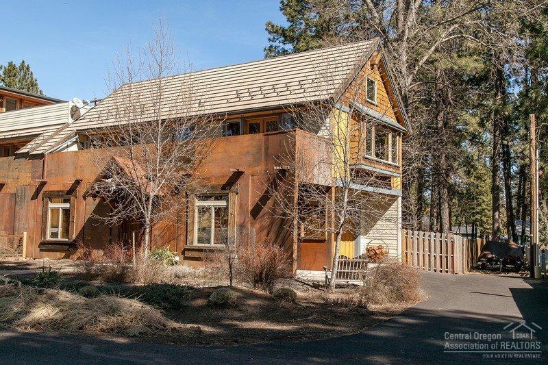 Custom Modern Rustic Town home in downtown Sisters. 3 bed, 2.5 bath, Cascade Mountain Views, 2 car attached garage, stained concrete floors with radiant heat, 10 ceilings, high end finishes and green features through out, stainless steel appliance, wool carpet, security system, wired for surround sound in and out, solid fir doors, gorgeous wood burning fireplace in great room, recycled wood floors and so much more!