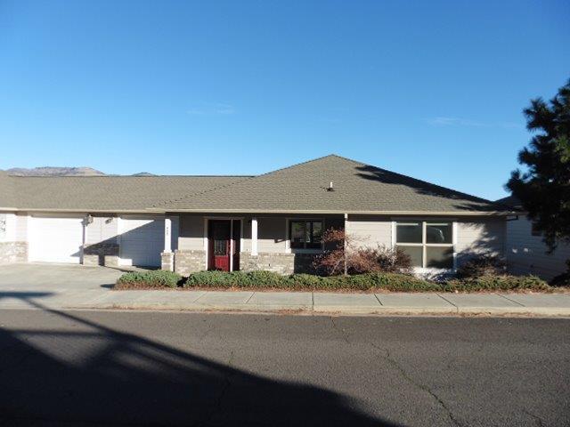 Great single family home perched on a hill overlooking Phoenix, mountains and distant pastures with fantastic views from the living room and decks. Step inside to this move in ready, 2 bedroom 2 bathroom home that has been upgraded with new flooring, interior paint and much more. Kitchen offers new granite counters and new stainless appliances. Large master shares the wonderful view and master bathroom offers a new shower surround. Unfinished lower level offers lots of potential and/or storage.