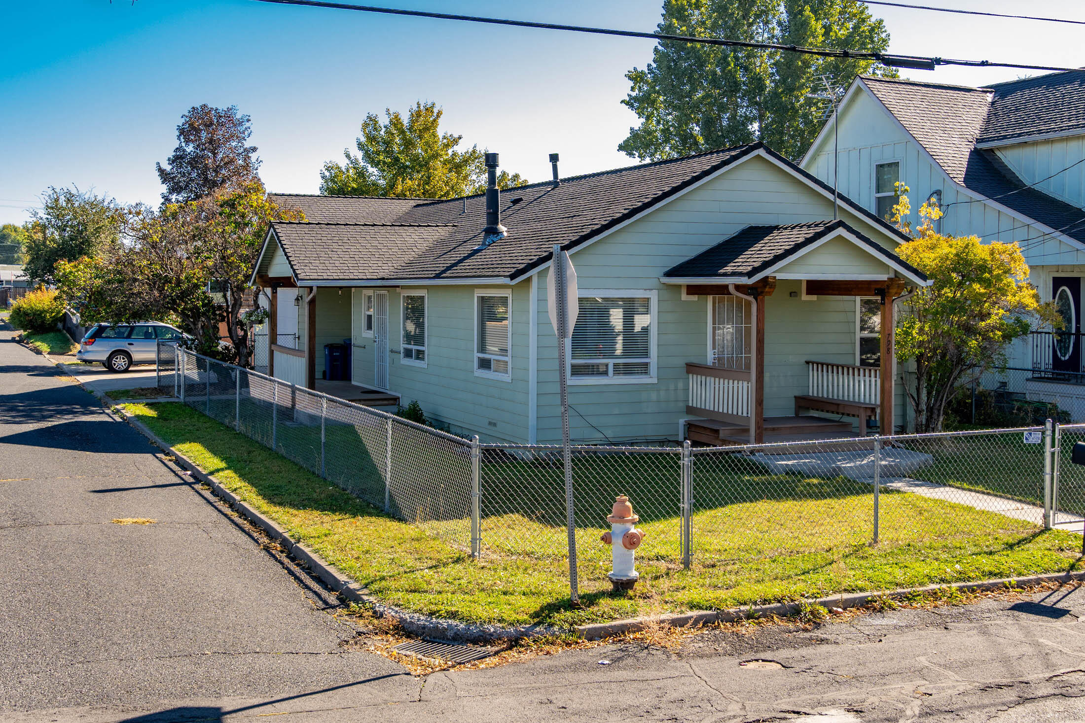 Welcome to this beautifully updated home in the heart of Prineville! Originally remodeled in 2006, this charming 2 bedroom, 1 bath , 884 sq ft cottage features modern updates throughout, including fresh carpet, paint, a stylish kitchen, new siding plus great garage. Comfortable spacious living room heated with gas freestanding stove plus forced air and HP for AC only. The fully fenced yard offers privacy and functionality, complete with a large side gate for access to the enclosed area perfect for storing all your toys and RV's, has a full RV hookup. A breezeway connects the home to a spacious detached double-car garage, adding convenience and lots of storage. Landscaped yard with a hand-driven well, perfect for irrigating the lawn (no pump is installed). This property combines comfort, practicality, and location—don't miss your chance to make it yours!