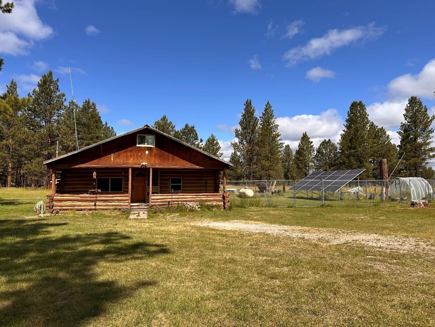 Private & Secluded 20-Acre Retreat near Sprague River OR - Off-Grid-Like Living. Tucked away on 20 serene acres, is this 1456 sq ft cabin-style home. Built in 1973, this 2-bedroom, 1-bath home is perfect for those seeking privacy, self-sufficiency, and a connection to nature. The property features a solar power system, providing negligible power costs and emergency backup. Inside, the cabin has a Mitsubishi mini split for heat & AC, certified wood stove and a tankless hot water system. The bathroom features a walk-in shower, and the part-finished attic provides extra storage. For relaxation, a hot tub sits inside a sunroom with great views.  There is also a fully fenced yard for fido. The home is accessible via a gated driveway with a solar-powered gate opener. The property has ample space for all your needs - equipment, vehicles, RVs, and 4H/FFA animals, horses, or other livestock. Seller is an Oregon licensed Broker.  Appx mileage - Sprague River - 8, KF - 40