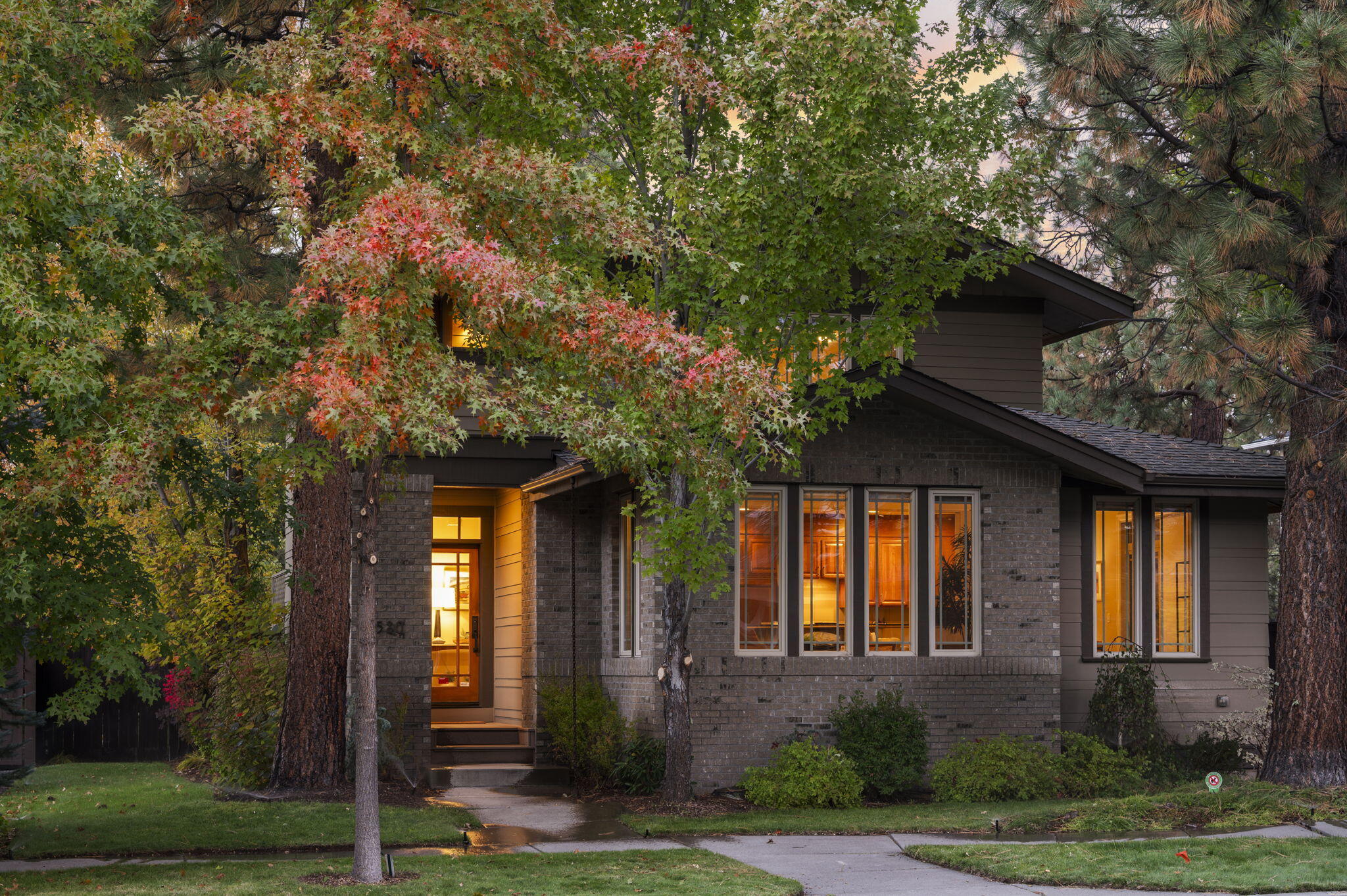 Northwest Crossing- an award winning neighborhood in Bend, Oregon. Main floor with primary suite, solid hardwood flooring, tall windows galore. Two outdoor living areas- Off the dining is a large, fenced patio with lush landscaping and privacy. Additionally, another outside area with grass lawn, hot tub, and fully fenced. A rare two-yard property in NWX. Upgrades continue- wool carpet upstairs, remodeled bathrooms. Vacu-Flo Central Vac and Hunter Douglas blinds. Home has two workspace options- one with it's own deck. Large garage has epoxy flooring, climate controlled wine room and hot & cold spigots. Rachio installed- an app controlled sprinkler system. Hidden driveway has parking for additional 3 cars. Home is low-maintenance so more time to enjoy the eateries, parks and Farmer's Market in Northwest Crossing.