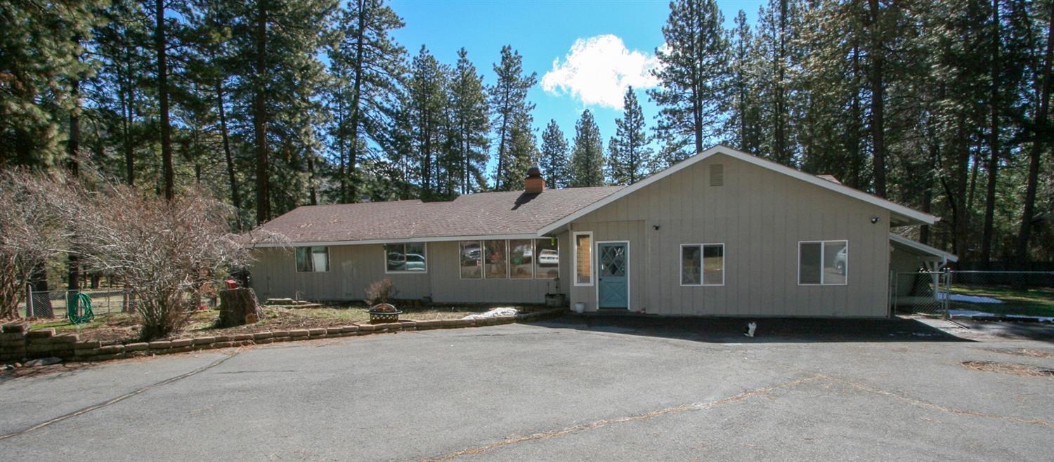 Ranch-Style home on 3 acres in Keno. Remodeled over-sized kitchen in 2009. Stainless appliances. Separate living room and family room plus office area off of the kitchen. Large deck off of the kitchen through a covered screened in hot-tub porch. Bedrooms are good sized and home has a lot of storage. The 2 car garage was converted to living space with three small rooms and a common area. 2-stall barn, tack room, hay storage and additional bay perfect for car, boat or snowmobile storage. Large driveway and room for trailer turn-around and parking. Covered RV parking approx 35' X 25' with attached heated office/workroom. Large level area in the lower pasture makes a great for a riding arena. Fenced and cross-fenced with 4 separate animal pastures. This is a beautiful area with a great location!