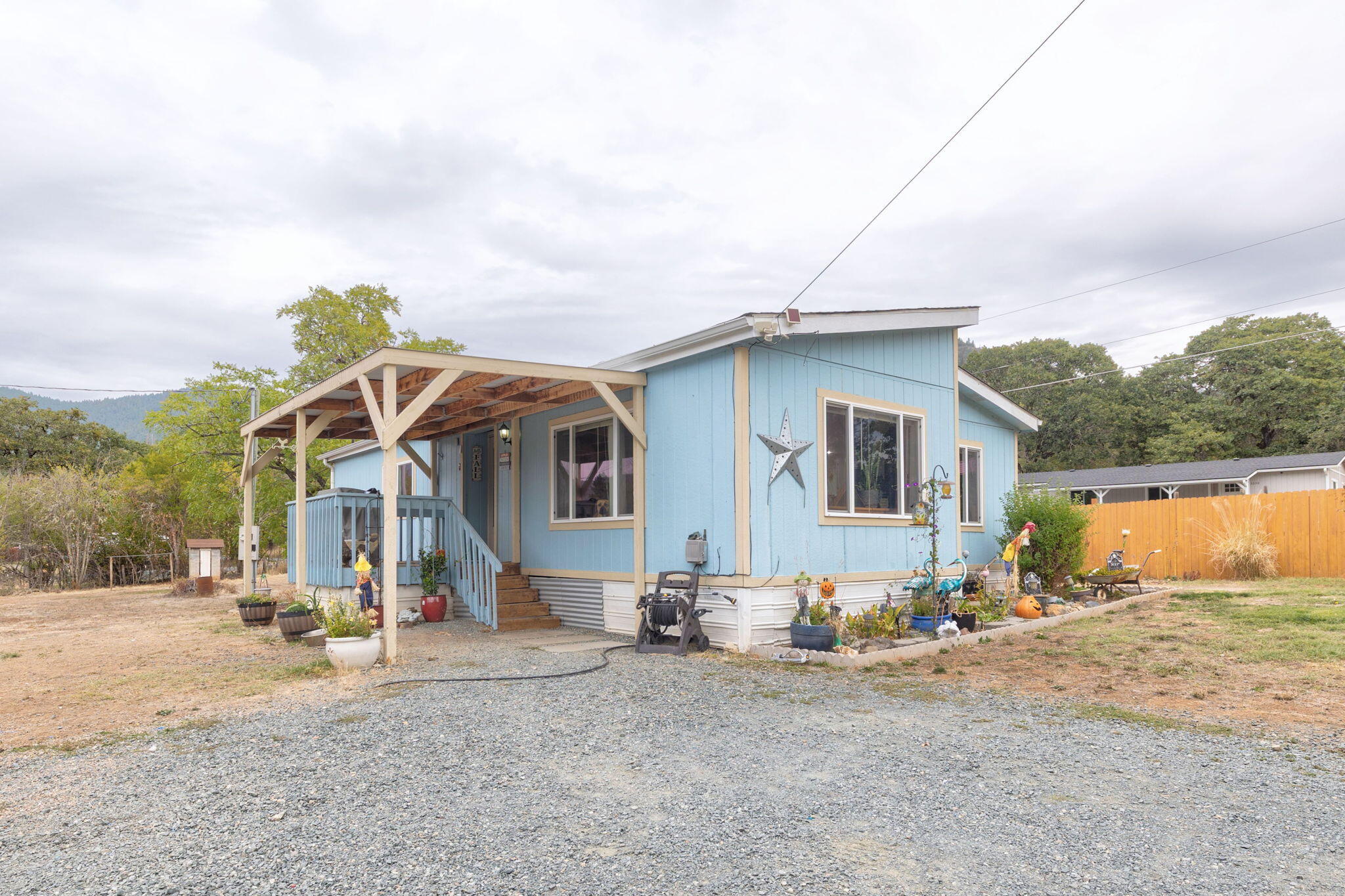 Discover space, comfort, and potential at 3000 Foothill Blvd! This updated 2 bedroom, 2 bath, 1188 square foot home sits on a generous .66 acre lot with room for animals, gardening, and outdoor living. Enjoy a beautifully refreshed kitchen, newer HVAC system, and a fenced yard featuring fruit trees and a cozy fire pit area perfect for gatherings. The detached 2-car garage includes a finished bonus space with potential for an office, studio, or future ADU. With plenty of parking, usable land, and endless opportunity to customize, this property offers a great blend of modern comfort and country freedom- all within easy distance to city conveniences.