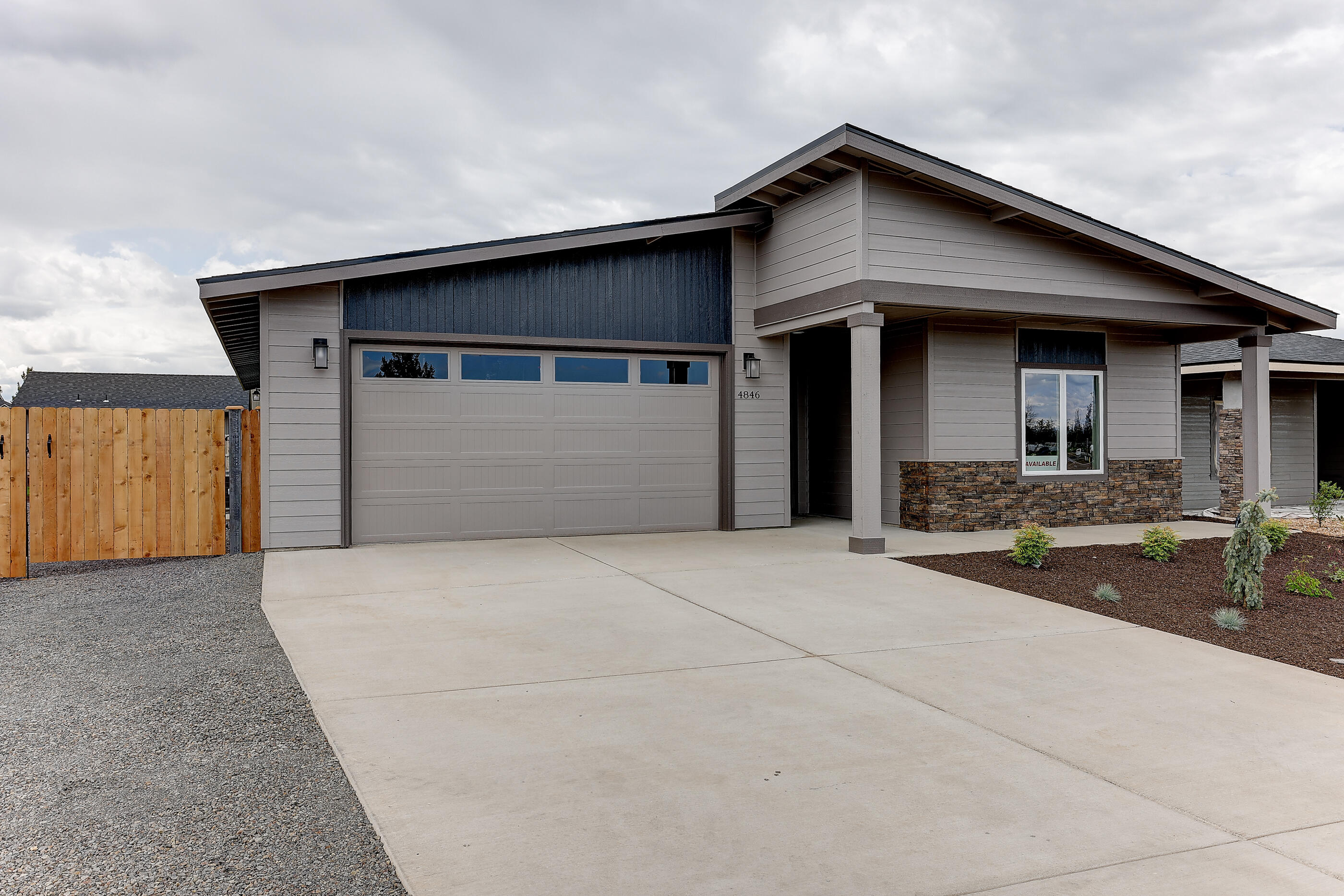 Just completed! Welcome to Korbin Meadows, Phase 1, a new community in desirable neighborhood of SW Redmond touting Cascade mtn views. Lot 8 is an oversized lot featuring the Titan floorplan w/ contemporary NW design. Single level living with 3 bdrms, 2 baths and 2 car garage. Extensive separation between primary bdrm (w/ walk-in closet & double vanity) & 2 guest bedrooms w/full bath. Entertain in your kitchen w/ SS appliances, corner pantry, full height tiled backsplash, extensive slab quartz countertops, large island opening to great room w/ decorative gas burning fireplace. Durable laminate plank flooring thru-out & carpeted bdrms. Utility/laundry room too. Oversized backyard w/ fence & landscaping w/ sprinklers, RV/boat parking & entrance gate. Upgraded finishes & A/C included! First home completed in Korbin Meadows.