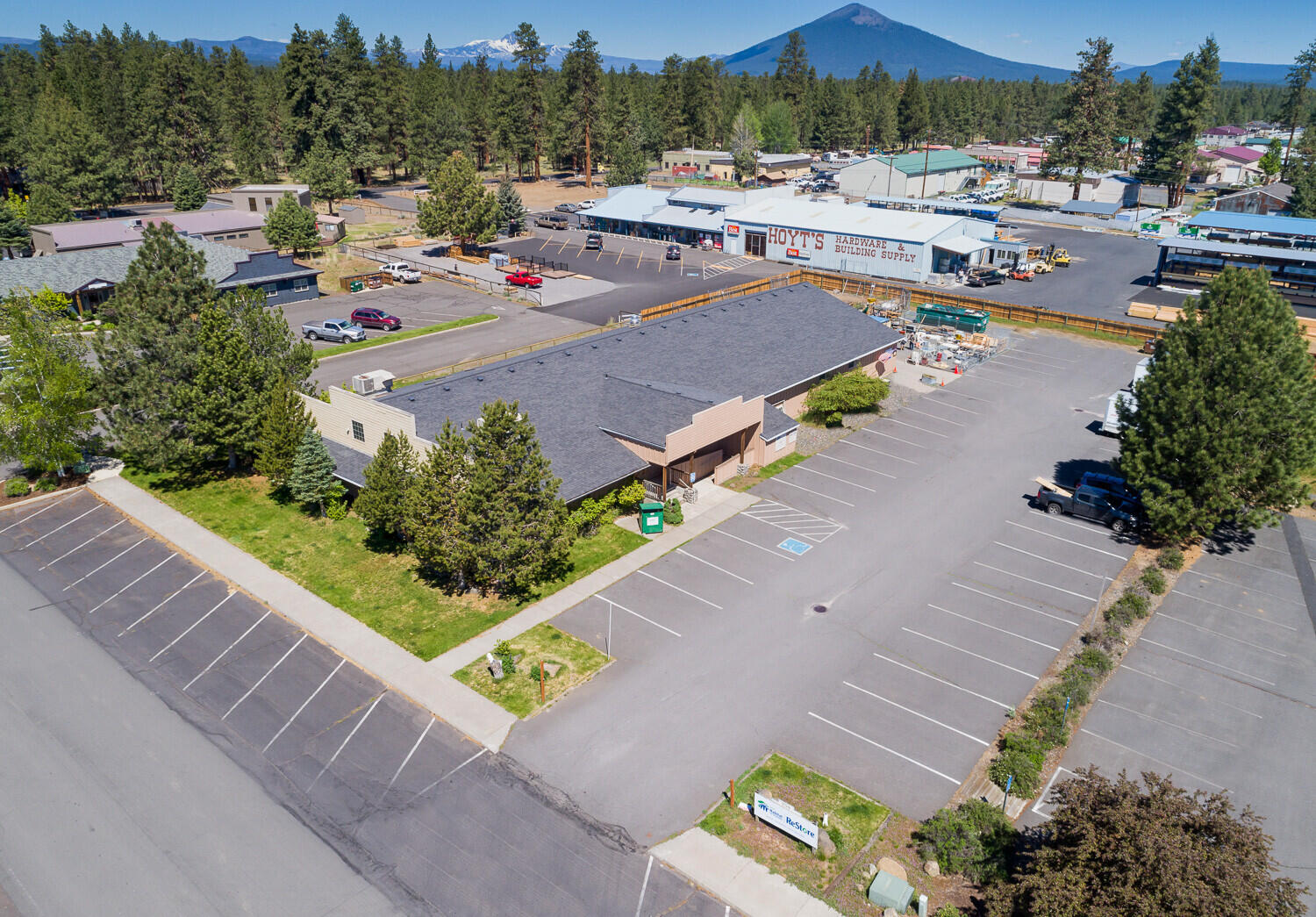 Just off the main drag in historic downtown Sisters OR sits this unique property. The inside of the building is complete with 14 offices, a kitchen, and break room. The warehouse area is over 5,000ft and includes a loading dock with roll up doors. The building sits on a 1 acre lot that includes a fenced storage area and large parking lot w/ 47 spaces. There is room to add an additional 9000+ ft of building footprint on this property. This one won't last long, schedule a tour today!