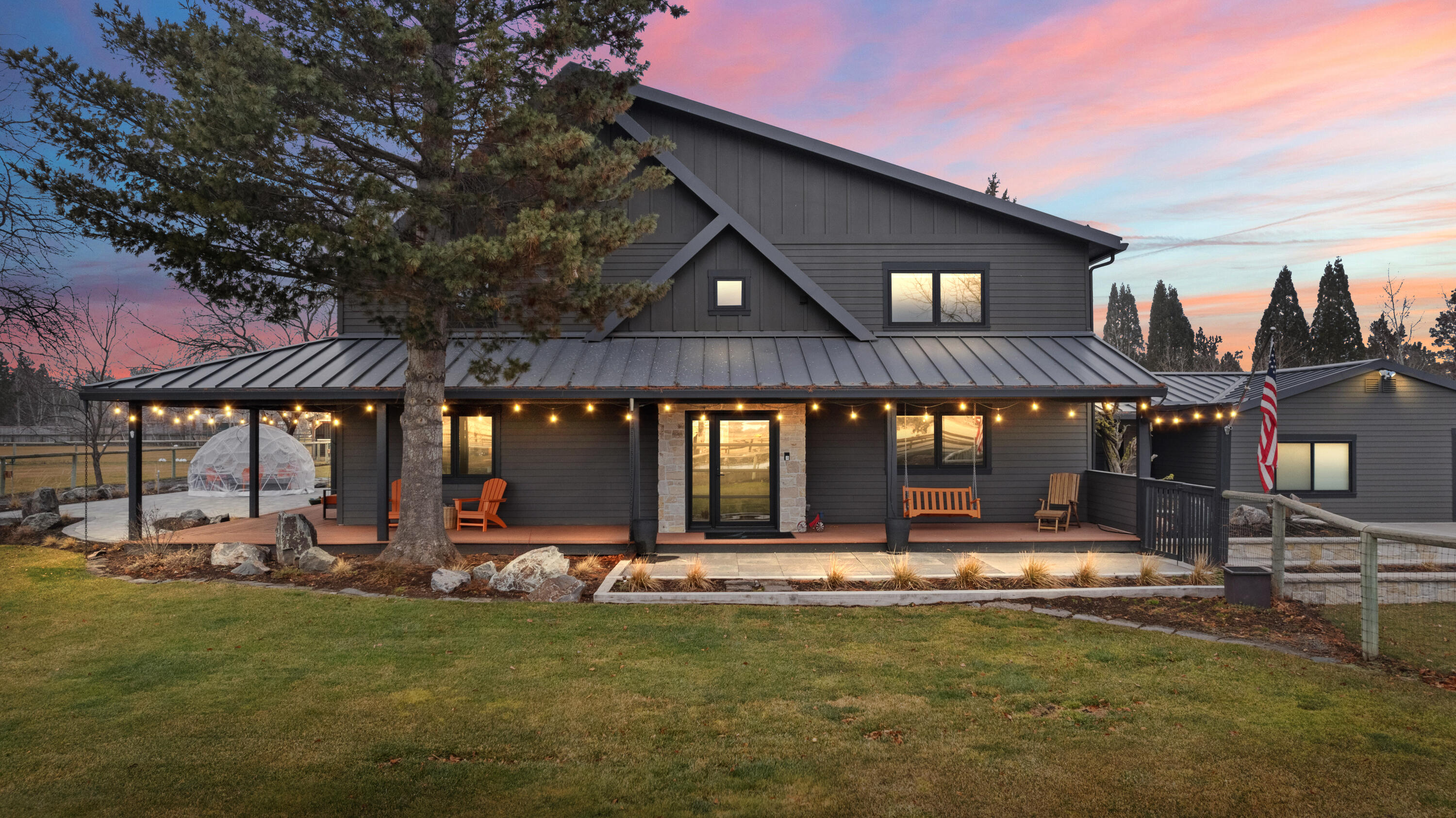 Discover the perfect blend of charm & modern convenience on this stunning Tumalo property, featuring a picturesque pond, shop & barn.This recently updated home is designed for both comfort & connection to its beautiful surroundings, with an open floor plan, abundant windows & glass doors leading to a wraparound porch with a  swing overlooking a large paver patio with firepit for soaking in the breathtaking mountain views. On 2.8 acres with Swalley irrigation, this property is ideal for those seeking space & serenity. Main level boasts a spacious kitchen & great room for entertaining, plus a large media room.Guest quarters are attached to the main house offering flexible living options w/a separate entrance, living area, bedroom, bath, kitchen & fenced outdoor area. Upstairs, the gracious primary suite features a spa-like bathroom, accompanied by two guest bedrooms & a loft. Large dedicated gear room, 400-amp power, RV plug & huge shop, barn, stalls, chicken coop-live the country dream