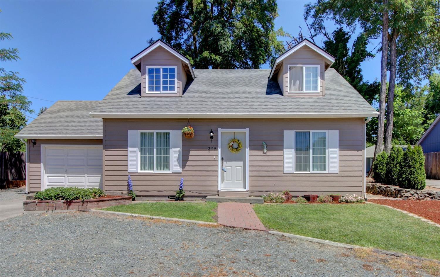 Don't miss this charming home, located on W Park St. short distance to the YMCA, Tussing Park, the Grants Pass Pedestrian Bridge, All Sports Park, and the Riverside Park. You will fall in love with the outdoor living space this home offers; it is close to bike paths and easy access to all there is to enjoy on the Rogue River. Designed perfect for gatherings; functional floor plan showcases plenty of entertainment space and a master on the ground floor. Beautiful new laminate wood floors, the family chef will love the delightful new kitchen cabinets and countertops! Don't wait to come see this beautiful home in person! Ideal location sets the stage for a truly convenient lifestyle: just minutes from Asante Three Rivers Hospital, and historic downtown Grants Pass with many specialty shops, a variety of restaurants, and entertainment. Whether you are looking for a new home, vacation escape, or investor's dream, and move-in ready. THE PERFECT PLACE TO CALL HOME!