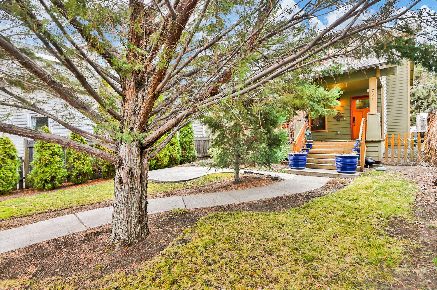 DREAM LOCATION!!!! in historic downtown Bend between Wall & Bond on NW Florida Ave. This beautiful craftsman was custom built and thoughtfully designed in 2006. 4 bedrooms, 3.5 bathrooms and a large loft make this a perfect home. Large fenced front yard with covered deck entry to the home. On the main floor you will find the great room with vaulted ceilings, dining area, half bath, mud/laundry room, and master bedroom. Upstairs is a large loft with 3 additional bedrooms, and 2 full bathrooms (one of the bedrooms is an en suite). Alley way access to finished single car garage, with a window and side door, allowing for multiple uses besides a garage. Front of home has desirable off street parking, very unusual in this location. Owned solar system brings the power bill to under $15 a month. Home is set back off street creating privacy with mature front garden that is full of colorful blooms all summer long. Accepting back up offers.