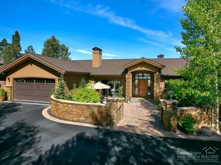 Captivating views of the Cascade Mountains can be yours from this award winning home on Awbrey Butte. Entering this handsome home, a gracious courtyard & water feature welcome you. Great room plan w/ wood burning fireplace, dining area w/ buffet & wet bar, great kitchen w/ slab granite counters, cozy den & more. Master bedroom & guest suite w/heated bathroom floors on main level. Lower level features 2 bedrooms/2 baths, family room & wine cellar. Perfect home to entertain indoors & out. Easy care yard.