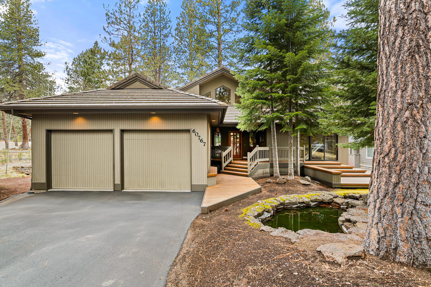 This stunning multilevel home offers the perfect blend of luxury, privacy, and convenience, making it an ideal choice for a full-time residence, second home, or 30+ day rental. Nestled within a private, gated Widgi Creek golf course community near the Deschutes National Forest, the property features  views of the 7th green, complemented by multiple water features, an outdoor fire pit, and a serene corner lot. The home's spacious layout was designed for comfort and style with ample room for hosting guests. Located just 5 miles from the vibrant Downtown and Old Mill districts and 15 miles from the Mt. Bachelor, this retreat also offers access to an indoor pickleball facility and nearby Deschutes River hiking trails. Set on 0.40 acres, this property combines a tranquil setting with close proximity to outdoor adventures and city conveniences, making it the ultimate escape. With an assumable 2.25% loan available to qualified buyer this is a rare opportunity to own a slice of paradise.