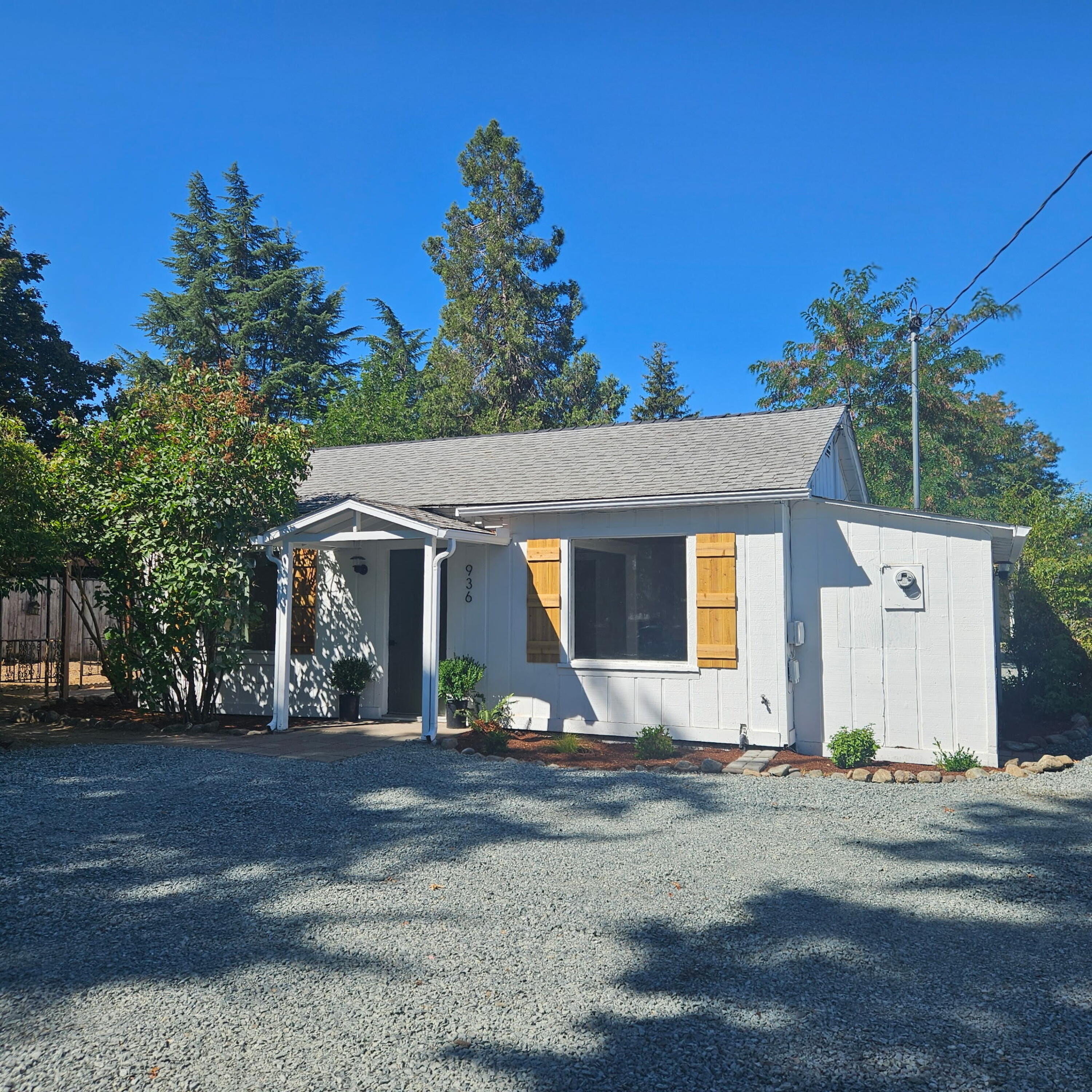 Welcome home to this cozy two-bedroom, one bath updated cottage located minutes from historic downtown Grants Pass, and just a short walk to the Reinhart Rivertrail walking loop, dog park & sport courts. 

Updated cabinetry, new flooring throughout. Upgraded lighting and plumbing fixtures with butcher block counters in the kitchen. Bathroom features custom tiled shower and flooring.
New Ductless heat pump system, detached two-car garage, and a private courtyard for relaxing or entertaining. Fresh landscaping and new gravel driveway. 
This extra large property is on 2 tax lots and has irrigation rights.