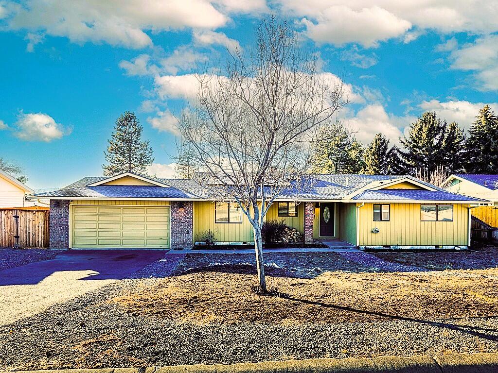 Placed atop Klamath Falls' east hills with sensational views of the Cascade Mountains, this 3-bedroom, 2-bathroom home provides the space and comfort for you and your guests. Step inside to discover abundant living space filled with natural light and picturesque views. The kitchen features sleek appliances and plentiful counterspace that flows perfectly into a formal dining area that overlooks the city. The primary suite is a true oasis, complete with heated bathroom floors for ultimate comfort, a walk-in closet, and a private exit to the deck. Two additional bedrooms provide versatility whether for guests, a home office, or room to grow. Step out onto the expansive deck to soak in the afternoon sun and enjoy the breathtaking Oregon sunsets. This eco-friendly home is powered by efficient solar panels, reflecting a commitment to sustainable and affordable living. Schedule your showing today!