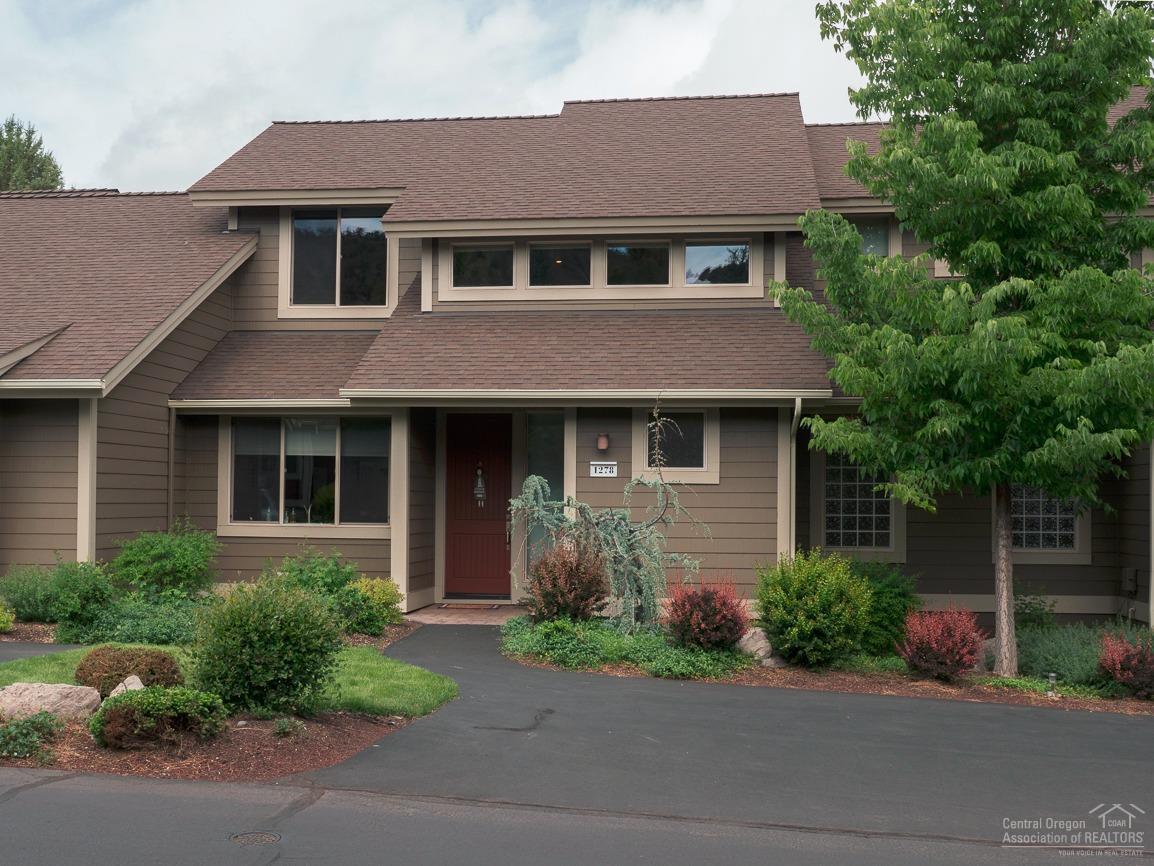 Open the windows or sit on the paver patio & listen to the soothing sounds of the creek. Beautiful 3BR, 2.5BA Creekside Town Home in Eagle Crest is the perfect getaway or permanent home. 1,871 sq ft with soaring ceilings and tons of windows. Lots of natural light! Great kitchen with granite tile counter tops and lots of cherry cabinets. Just steps to the Sports Center, pool, tennis and all that Eagle Crest has to offer.