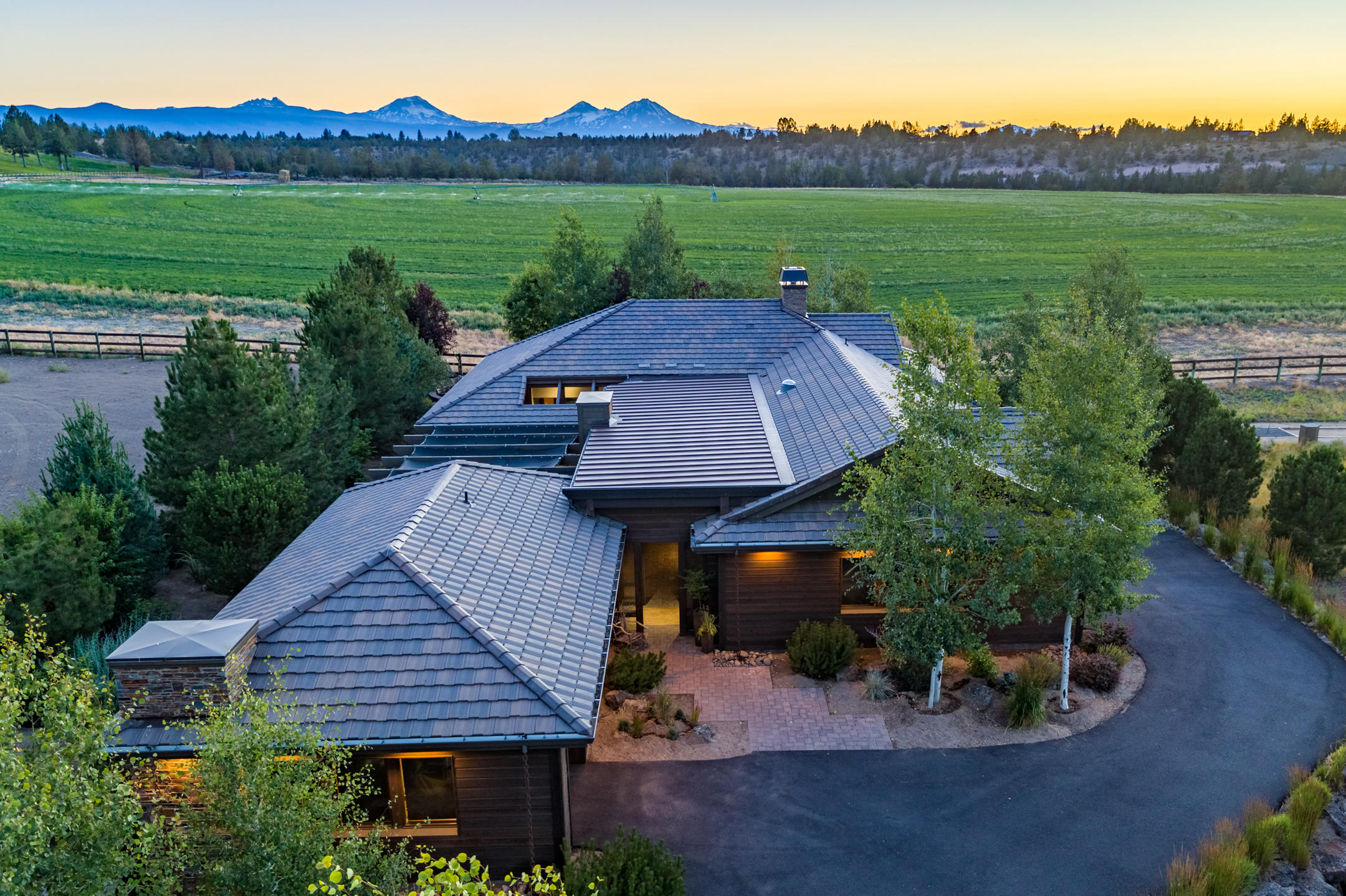Stunning quality single level w/attached casita, 2831 sf, 3 bed, 3 bath all sitting on .42 of an acre w/privacy and unobstructed Cascade Mountain views located in a historic Tumalo ranch. Deschutes River Ranch is a very special community unlike any other close to Bend boasting nearly 2 miles of private river access, trails galore, riverfront pavilion park and gazebo all for your enjoyment and/or entertaining pleasure. The thoughtful artisan's design of this custom home shows in every detail from copper accents, to multiple private outdoor living spaces, beautiful chef's kitchen & gorgeous flower filled grounds. Exit the home or casita into a cozy private courtyard to warm yourself by the spectacular courtyard fire pit. Sit out back on the covered paver patio or around the back fire pit and soak in the views of the 3 Sisters and Broken Top. Here there is peace and quiet and something to delight at every turn in this exceptional home in an area where homes are rarely available for sale.