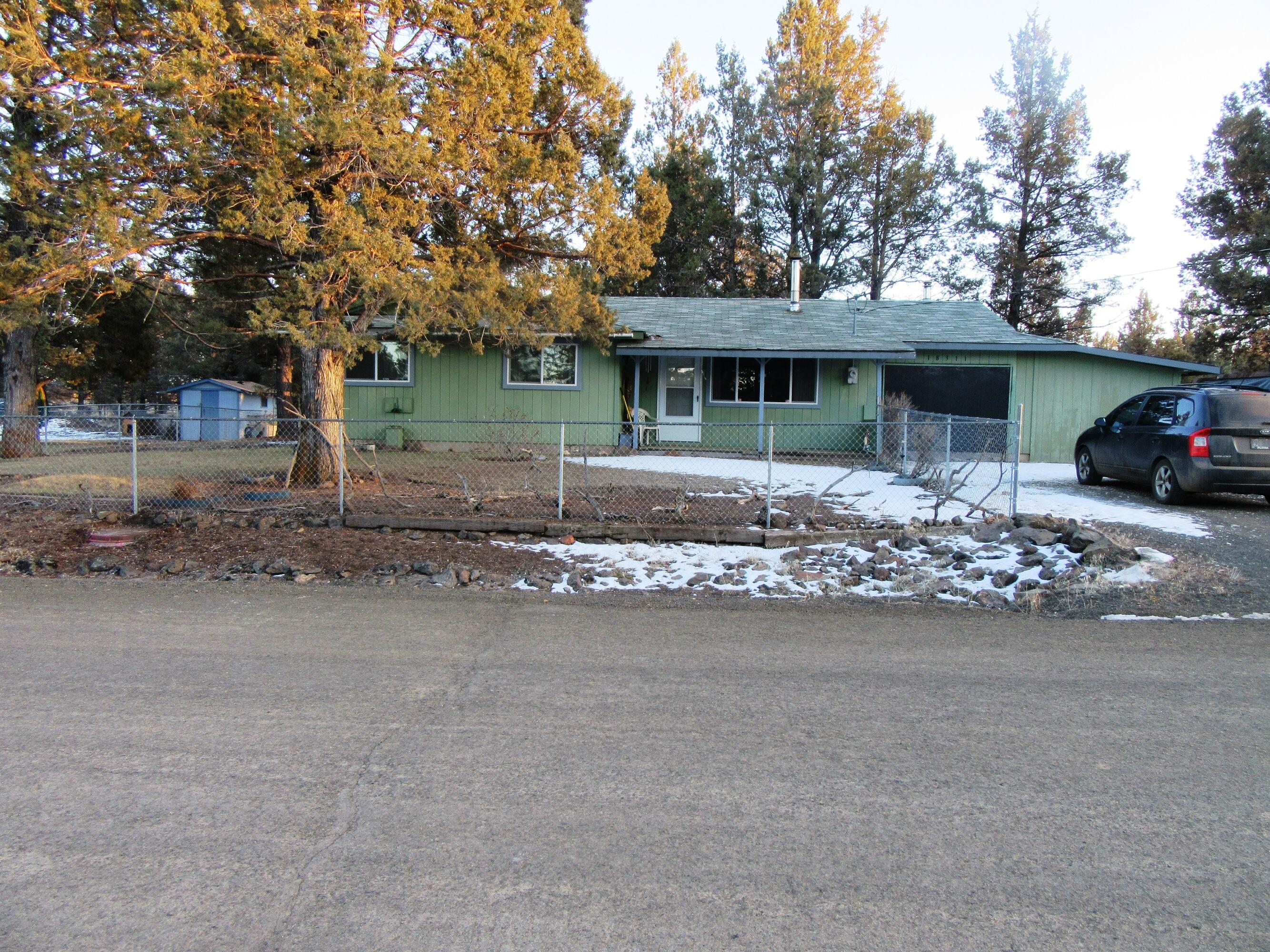 $125,000  Nicely laid out  3 Bedroom 1 Bath Ranch style Stick built home with city water & city sewer on just over a 1/4 acre of land with fenced front and back yards. Home has wood stove and forced air electric heat Covered decking/patio on back of home. Oversize 1 car garage with extra area being set up for wood storage room as extra part of garage. Interior pictures coming.