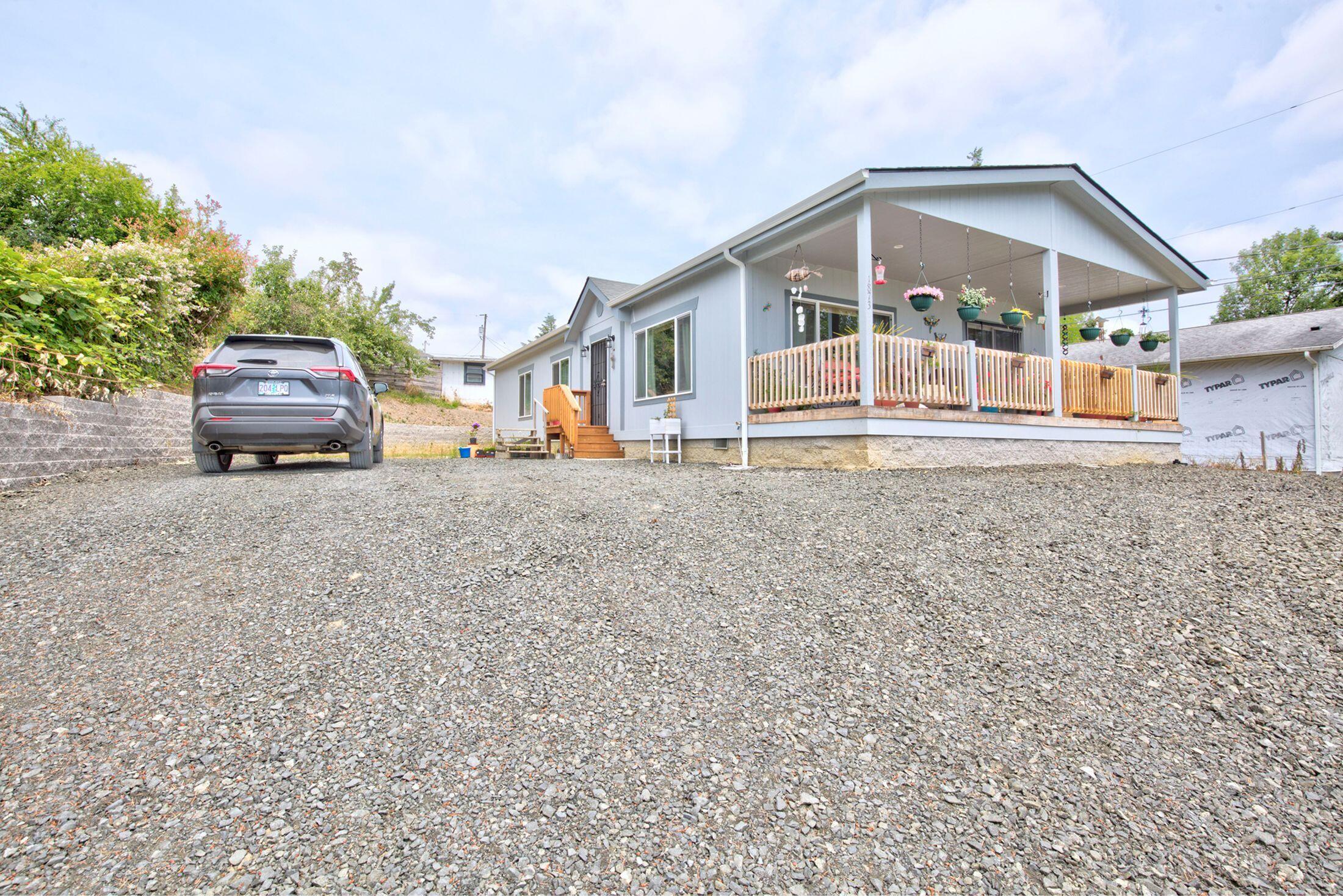 Just like new! 2020 Fleetwood Waverly Crest doublewide on a 0.18-acre lot. Home has been occupied since Spring of 2021 and seller needs to relocate ''wishing she could take home with her''. All appliances and fixtures are basically brand-new. Home has an open floor plan with lots of windows to take advantage of the lovely view. The kitchen includes an island for additional work space, custom built additional cabinetry in the dining area, and a nice size pantry. The living area, dining rom and kitchen have a nice open floor plan. Property has public water and sewer and is located on a private street convenient to shopping and services.