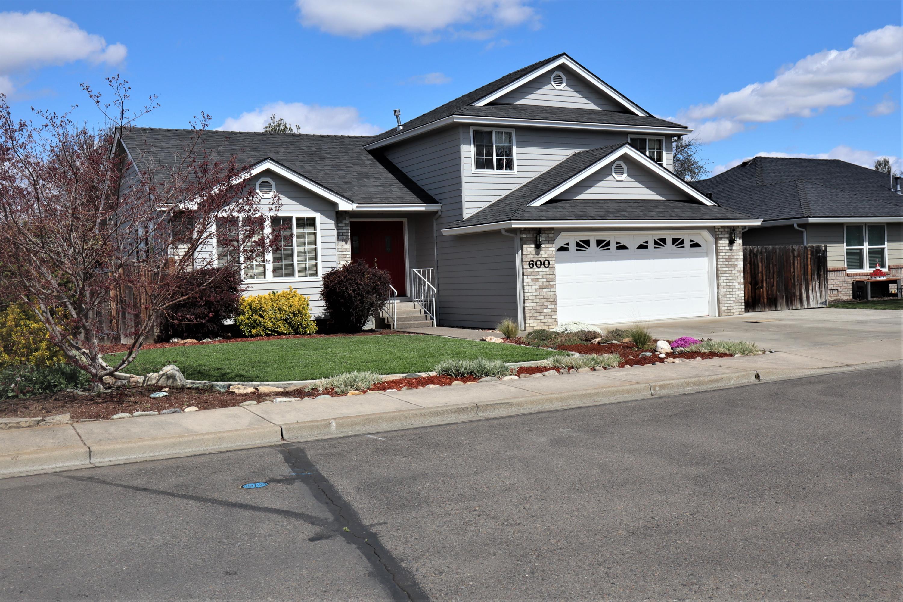 Don't miss out on this fabulous Jackson Creek Estates home. Immaculate both inside & out.  Tri-Level design provides nearly 2,000 sq ft of living & easy-to-maneuver stairways to both the upper level bedrooms & Bath as well as to the lower level Family Room or huge Master Suite – whichever suits your needs.  Main Level provides large Living Room, Dining Room & Kitchen. Upstairs are two large Bedrooms, Jack-and Jill Bath with Jetted Tub & separate shower, & large built-in Linen Storage. Downstairs is the very large Family Room/2nd Master Suite with Gas-burning Fireplace, big deep closet, attached Bath with Jetted Tub & separate Shower.  Sliders lead to the covered back Deck & Patio. The yard is perfectly landscaped with defined walk-ways, privacy fencing & adorable storage Shed that matches the home. The multi-level Deck provides lots of space to Bar-b-que & relax. Plenty of room for a Hot Tub.  Large attached 2-car garage & also gated RV parking. In-ground sprinklers both front & back.