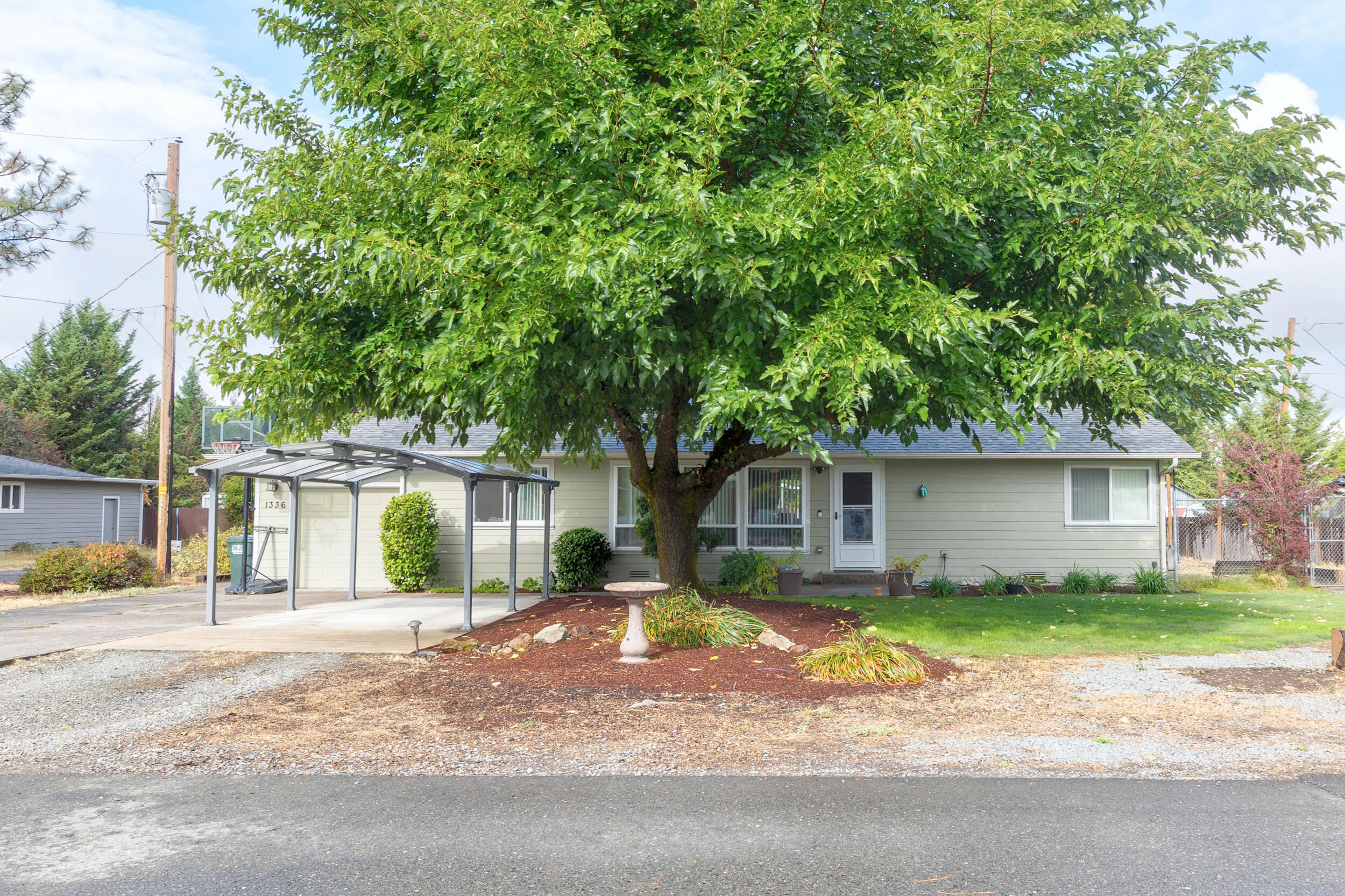 Perfect for first-time buyers, this 3 bedroom, 2 bath, 1,320 square foot home offers modern comfort and convenience. Originally built in 1966, it was completely rebuilt in 2013, giving you peace of mind with updated systems and finishes. The single-level layout is easy to maintain, while the large backyard provides space for pets, gardening, or weekend BBQs. Nestled on a quiet street, yet close to schools, shopping, and Highway 199, it is an ideal spot to enjoy both privacy and accessibility. Plenty of parking provides room for cars, RVs, or toys. A move-in ready home where you can settle in and start building your future!