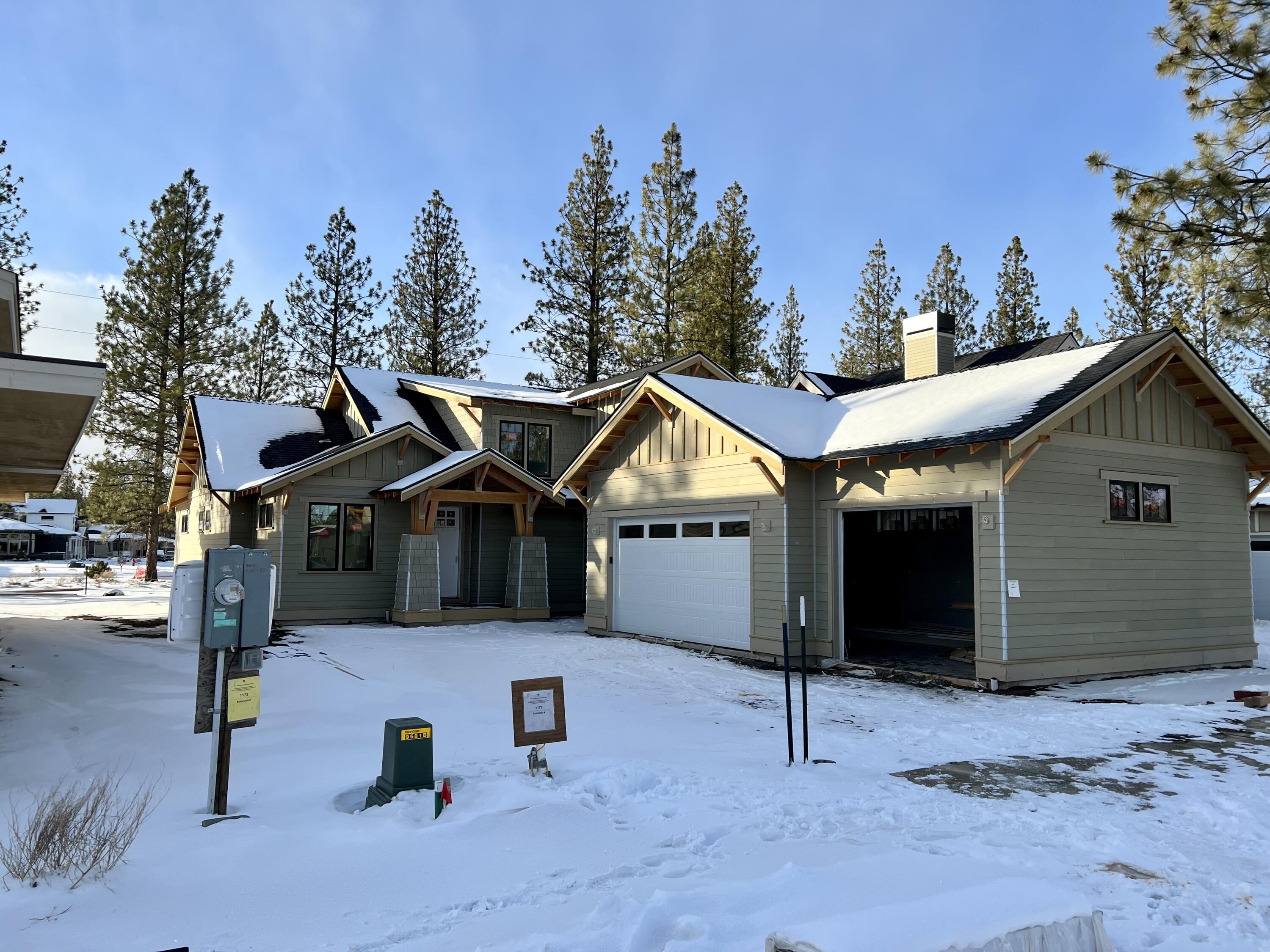 Beautiful Craftsman style home under construction in one of the most popular neighborhoods on Bend's NW side close to schools, restaurants and shops. Living in Discovery West means you can enjoy the forest and nature trails out your front door. This home is perfect for entertaining and the chef's kitchen includes a large center island and top of the line appliances. The master bedroom, an office and large utility room are on the main floor. Two more bedrooms and a full bathroom are upstairs. The three car garage, covered patio, low maintenance landscaping in the front and back, plus a fully fenced backyard make this a perfect home for the NW Bend lifestyle. This fabulous home by well known builder, Heritage Homes NW will be ready for a new owner this spring.