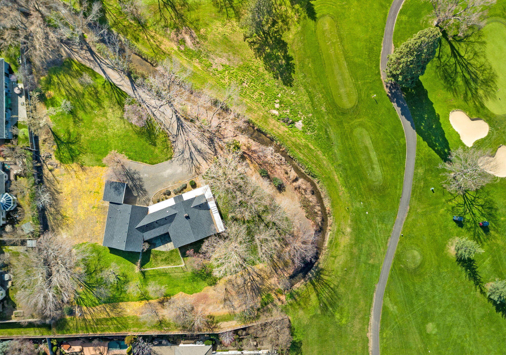LOCATION!!! LOCATION!!! Rare one of a kind.. on The Rogue Valley Country Club!! Beautiful property of 1.35 acres located on the 7th fairway. Views of golf course ponds, creek and luxury space of property. Includes a 1955 year built home with 1,985 sq ft, 2 bed, 3 bath. Plenty of privacy on the highly desirable Country Club. Listing Agent is related to Seller.