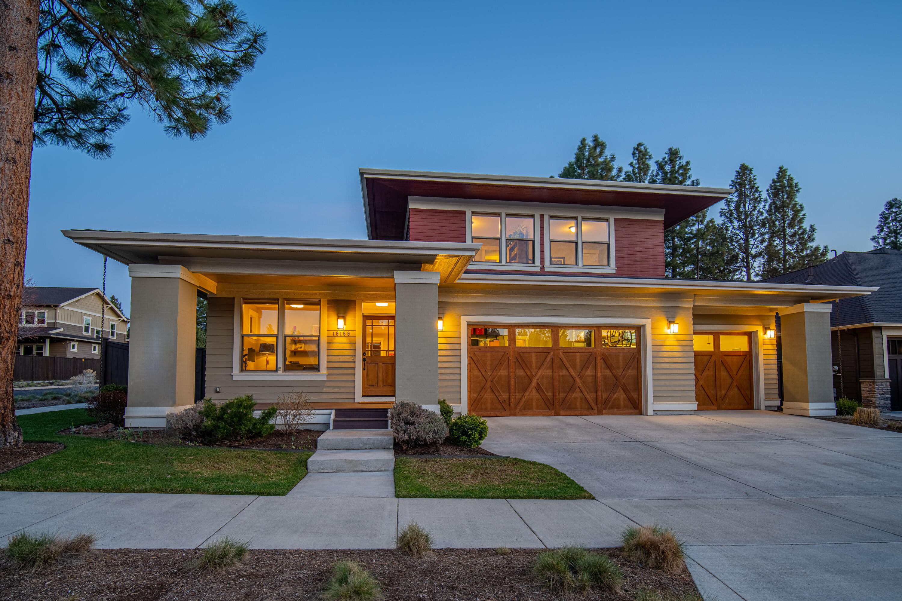 Everything you want and more near Shevlin Park! Built in 2011 by reputable builder, Greg Welch, this 4 bedroom home has it all w/ 3 car garage, fenced backyard including large deck, custom concrete privacy wall w/ fireplace and bench seating, open concept floor plan, main level primary suite and office, plus 3 additional bedrooms upstairs as well as a loft for that bonus space you've been seeking. Spacious primary suite features walk-in closet, and remodeled bath w/ dual vanities, slab counters, custom tile shower, and soaking tub.  Other features include stainless appliances, Earth Advantage + Energy Star Certification, gas fireplace w/ custom built-ins in living room, corner lot, and mature landscaping. Don't miss this thoughtfully designed custom Prairie style home on Bend's NW side.