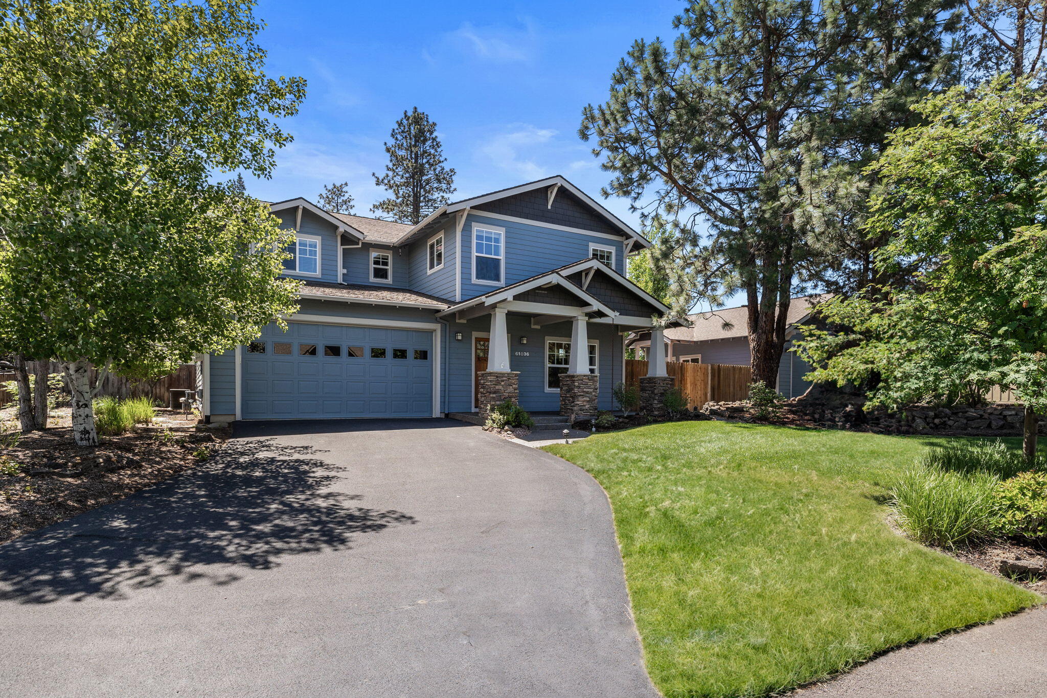 Have the best of both worlds in this superior quality Palmer Home with stunning outdoor kitchen and an additional detached heated garage on a 1/3 of an acre. This property is also backed by an acre of community common space! Upon entering, you'll find exquisite touches without pretentiousness; box beam ceilings, ¼ sawn hardwood and Calais stone tile flooring, Knotty Alder cabinets, stainless appliances and a pass through butler's pantry w/ a sink. All bedrooms are upstairs including a spacious primary suite w/ two walk in closets and a large bonus/media room or a 4th bedroom. No shortage of space for toys! A 3 car tandem garage is accompanied by a detached heated and insulated 22x26 garage w/ 240 and roll-up doors in front and back. The covered custom outdoor kitchen will amaze as you toast friends and family after day of living the ultimate Bend Lifestyle. Great SE Bend location near lots of new hotspots; Caldera HS, Alpenglow Park, Larkspur Community Center and Cascade Lakes Brewery.