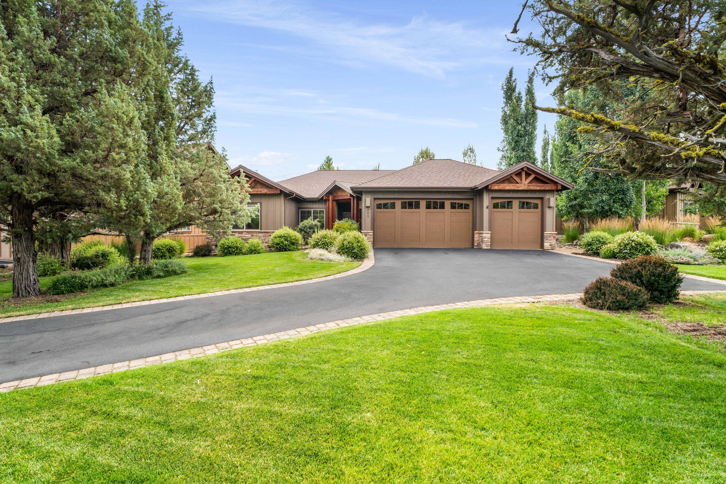 Discover the Vista Rim neighborhood at Eagle Crest with its ''secret garden''  backyard that features ponds, fountains, creek and walking path.  The gracious entry invites you into an open layout home featuring a spacious vaulted great room, a picture window to the scenic backyard, complete with a cozy gas fireplace with both mantle and hearth.  Paint color, wood cabinetry and tile choices all lend the warmth and color palette of central Oregon.  Its ''cooks kitchen'' boasts ample storage, a generous pantry and abundant tasking counter space.  Updates to the kitchen include a new range with induction cooktop installed in 2024, new refrigerator installed in 2022 as well as a new faucet and updated kitchen lighting. Spacious primary suite with walk-in closet, separate vanities, soaking tub, and walk-in shower. Two additional  bedrooms and full bath for guests. Third bedroom could be used as an office.  Triple car garage with parking pad for guests. HOA maintains landscaping.