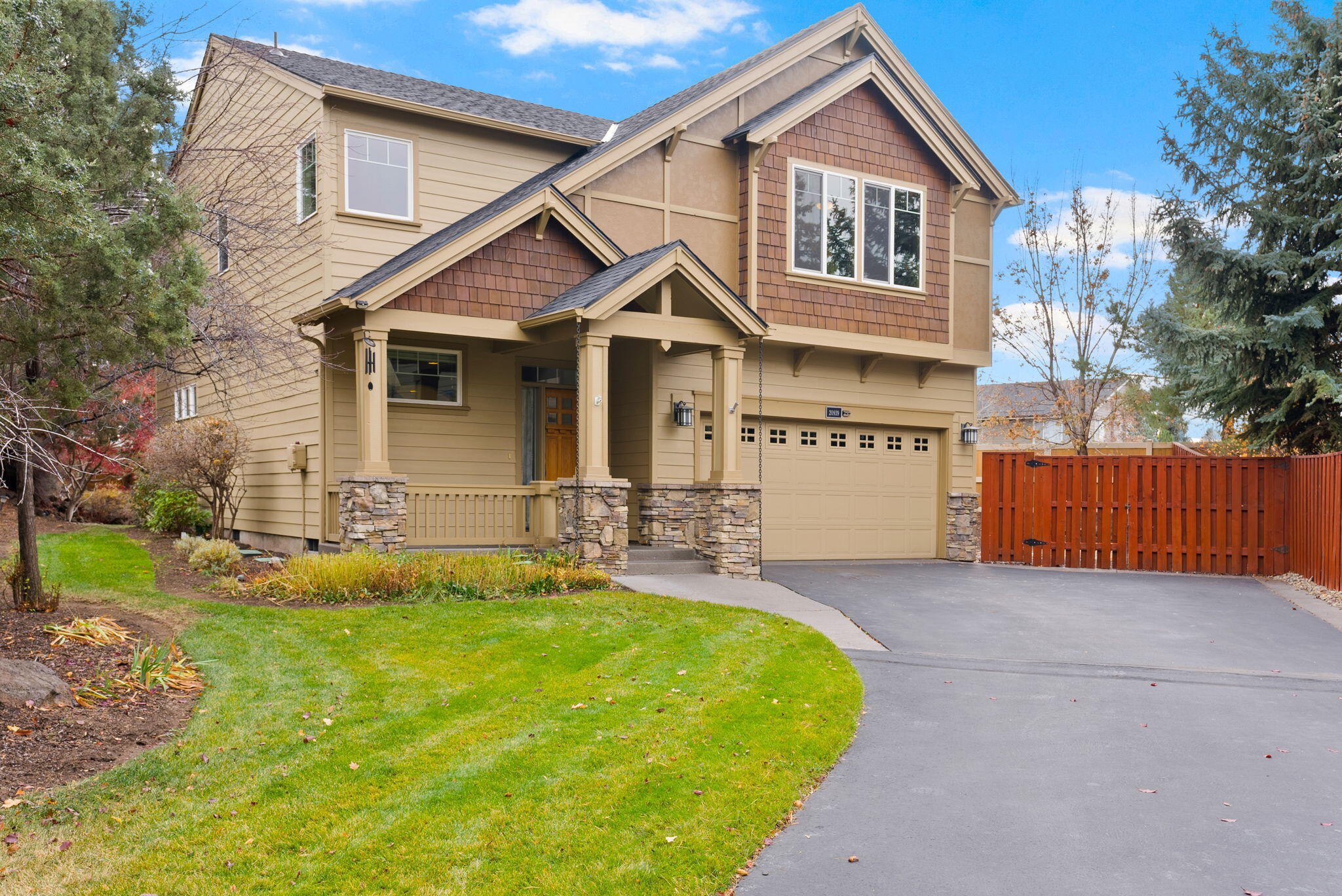 Located in Lava Ridges in NE Bend near Pine Nursery Park, this home sits at the end of a long driveway that provides privacy from the cul-de-sac, along with extra parking for a small recreational vehicle or trailer & a spacious triple-car tandem garage. Inside, the open-concept floor plan welcomes you in, with the upper level offering a flexible loft/office space & a large bonus room that could serve as a fourth bedroom. The primary suite features vaulted ceilings and a beautifully updated bathroom (2024). This property also borders land owned by Bend Park & Recreation, enhancing the sense of privacy. Major updates bring peace of mind, including exterior paint (2023), new carpet (2024), a brand-new roof (2024), fully paid-for solar (2024), and a new water heater, furnace, and AC (2024). The kitchen and both bathrooms were also refreshed in 2024, making this home truly move-in ready. Plus, enjoy the community pool and front yard landscaping maintained by the HOA.