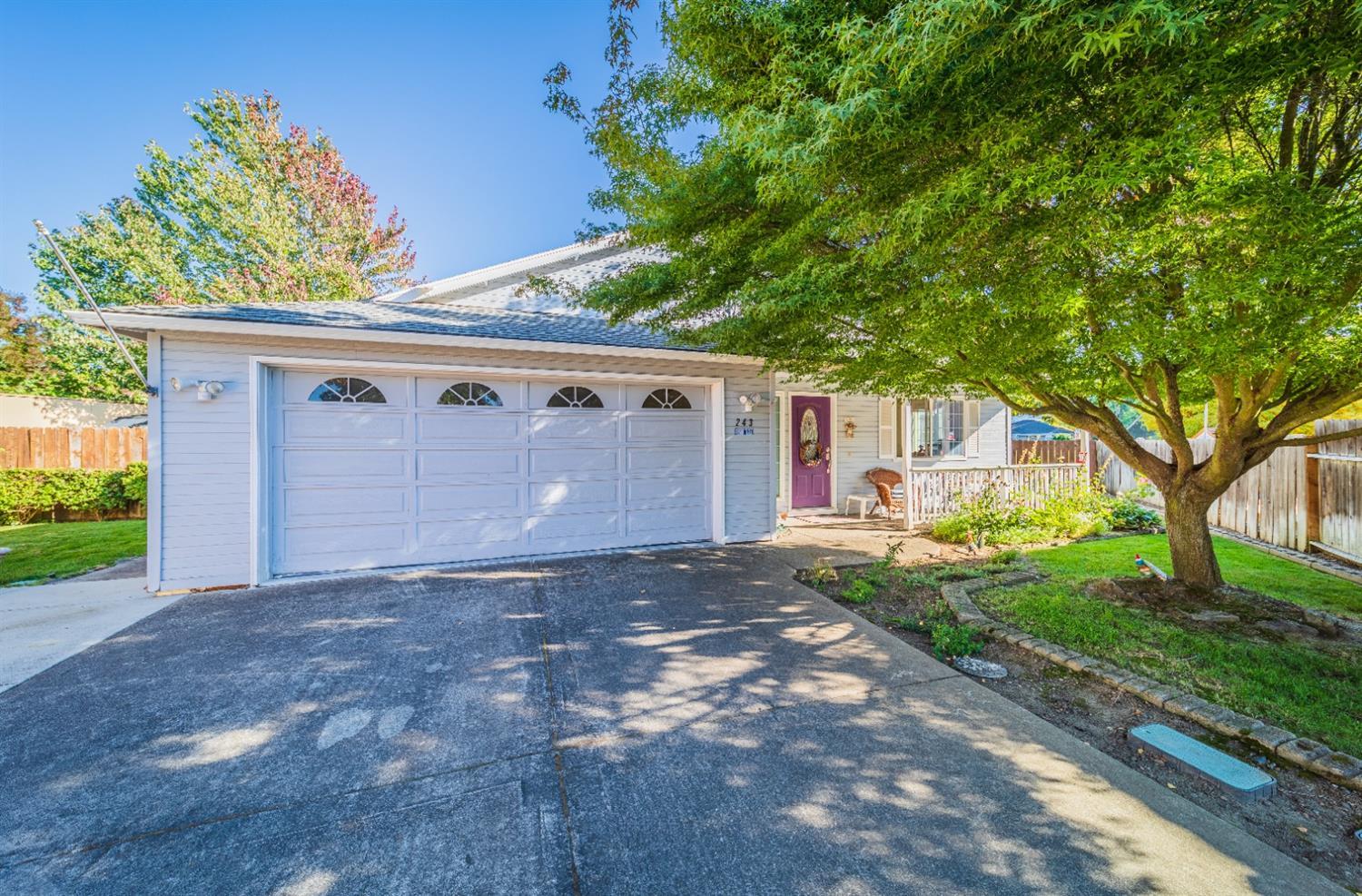 Lovely private home at the end of private drive. Beautiful light oak laminate flooring, tile in the kitchen and bathrooms. Master bedroom features soft carpet and giant walk-in closet. Huge kitchen with tons of counter space and cabinets, including pantry space. Enjoy your morning coffee in the 300 sq. ft. sunroom or sip it next to the gorgeous water feature out back. Private backyard boasts two storage sheds, patio for entertaining and stunning fountain which feeds a small stream into a koi pond and backs up to the beautiful Colver Road Park. 1-year Home Warranty included!