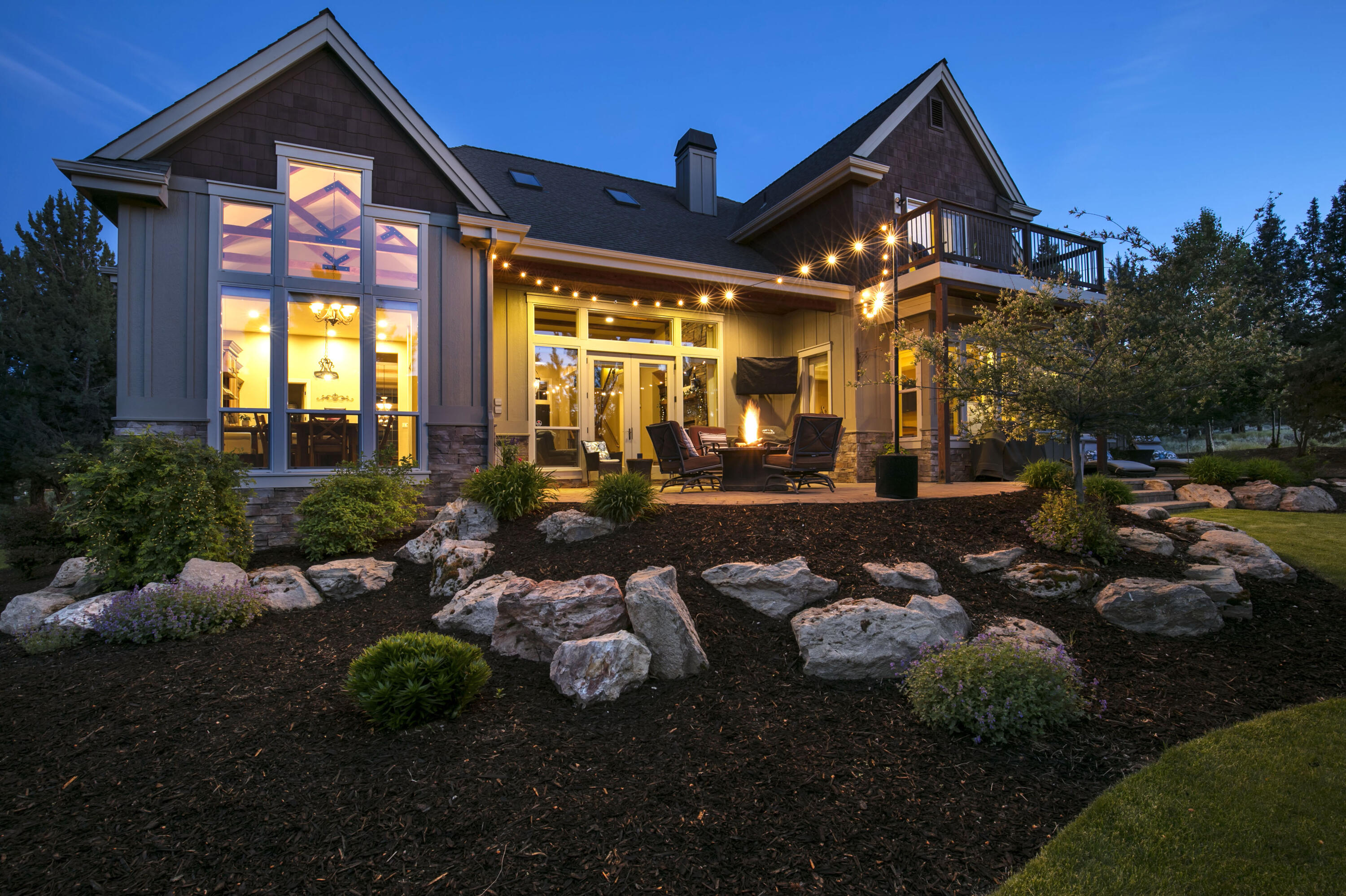 Endless potential & possibilities await - permanent or part-time residence, vacation rental, or corporate retreat in this EXQUISITE home in the award-winning resort at Eagle Crest! Not a single detail was overlooked with every built-in and luxury finishes throughout this large floorplan, with five large bedrooms - all ensuites, perfect for you and your guests to stay and live in ultimate comfort and includes full access to the resort amenities - parks, pools, sports centers, ball courts, walking trails, restaurants, and much more. Special features include: designated workout room with infrared sauna & cork flooring, media/theatre space with wet bar, loft game room/playroom, multi-level laundry hookups, hot tub, pet enclosure, raised garden beds, outdoor play structure, and an exceedingly generous amount of storage throughout the home. You will be left wanting for nothing more - this property truly has it all!
