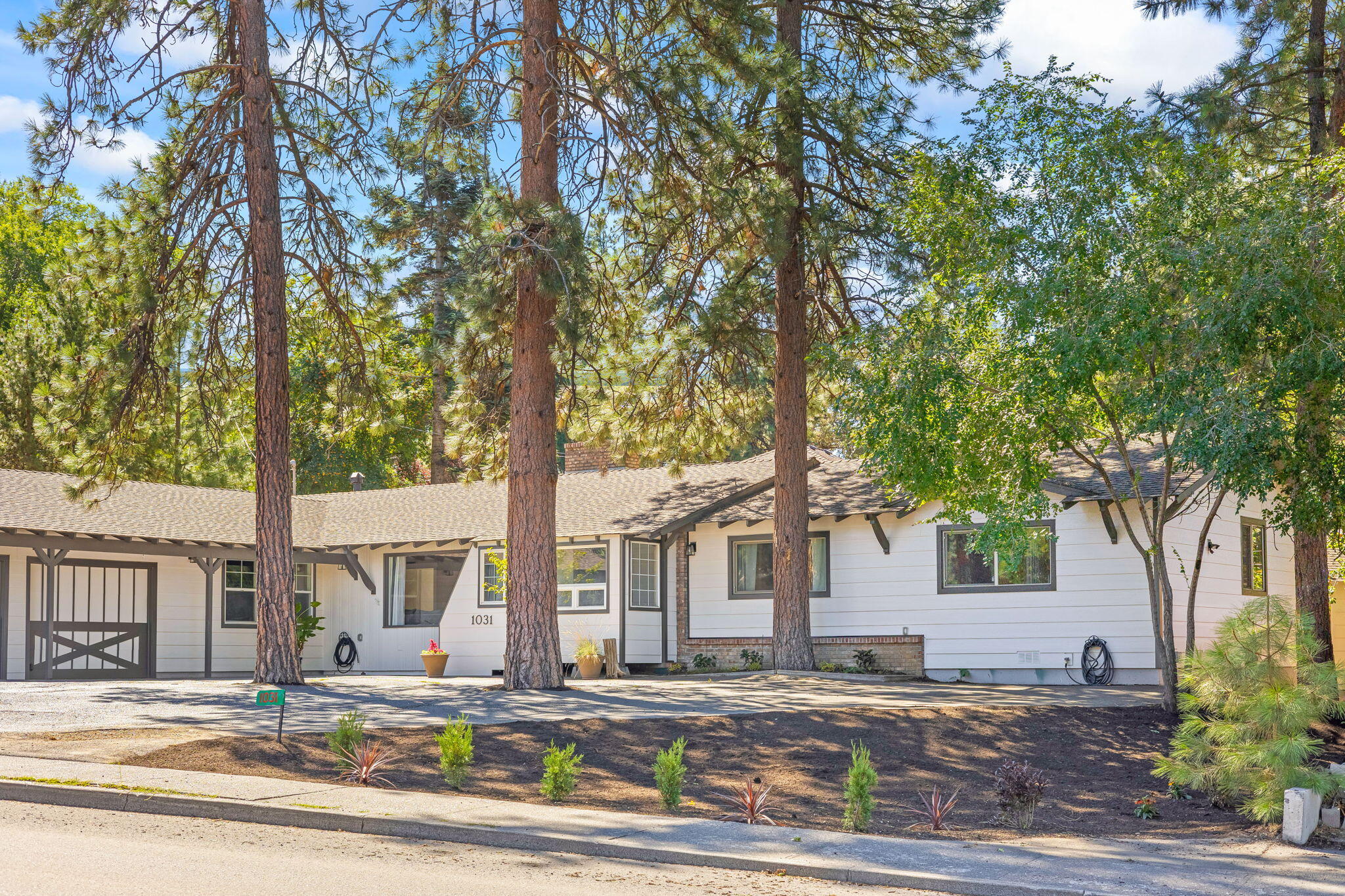 Completely rebuilt from the studs in 2022, this stunning 3-bed, 2.5-bath Midtown Bend home blends modern design with timeless quality. Every detail has been upgraded—new windows, doors, trim, siding, and paint. The gourmet kitchen shines with quartz counters, stainless appliances, original copper hood, 2020 KitchenAid fridge, GE dishwasher, and wine & beverage fridges. Spa-like primary bath with curbless tile shower, dual heads, and bidet. Brand-new electrical panel, 5-ton AC, updated furnace, PEX plumbing, and LG washer/dryer. RV parking with 30-amp hookup, room for 5+ vehicles, and Trex deck with natural gas for an outdoor kitchen. Yes, it's on Penn Ave—but set far back from the street and built so well that road noise isn't an issue. Come see (and hear) for yourself! Rare Midtown opportunity—schedule a showing today!