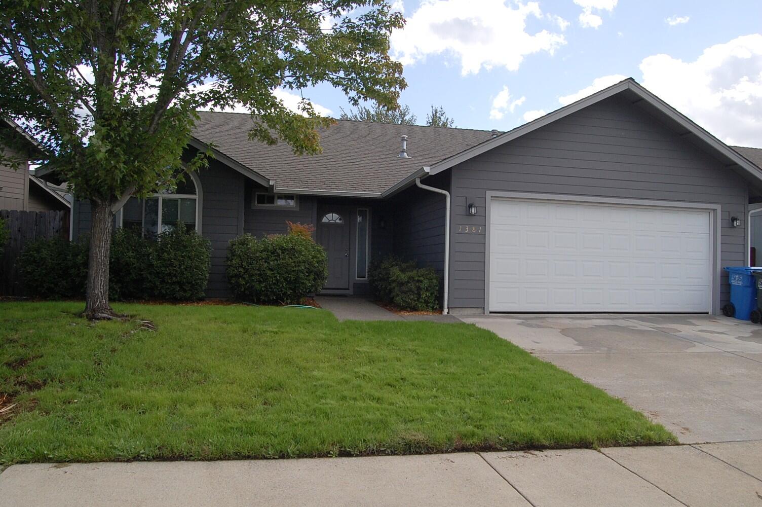 This great home built in 2004 looks like new inside and out.  Freshly painted interior, new laminate flooring throughout, new range/oven. Open floor plan,  lots of natural lighting. New Heat and air within the last year. Easy care back yard.  Located in a well maintained neighborhood. Close to downtown Grants Pass.