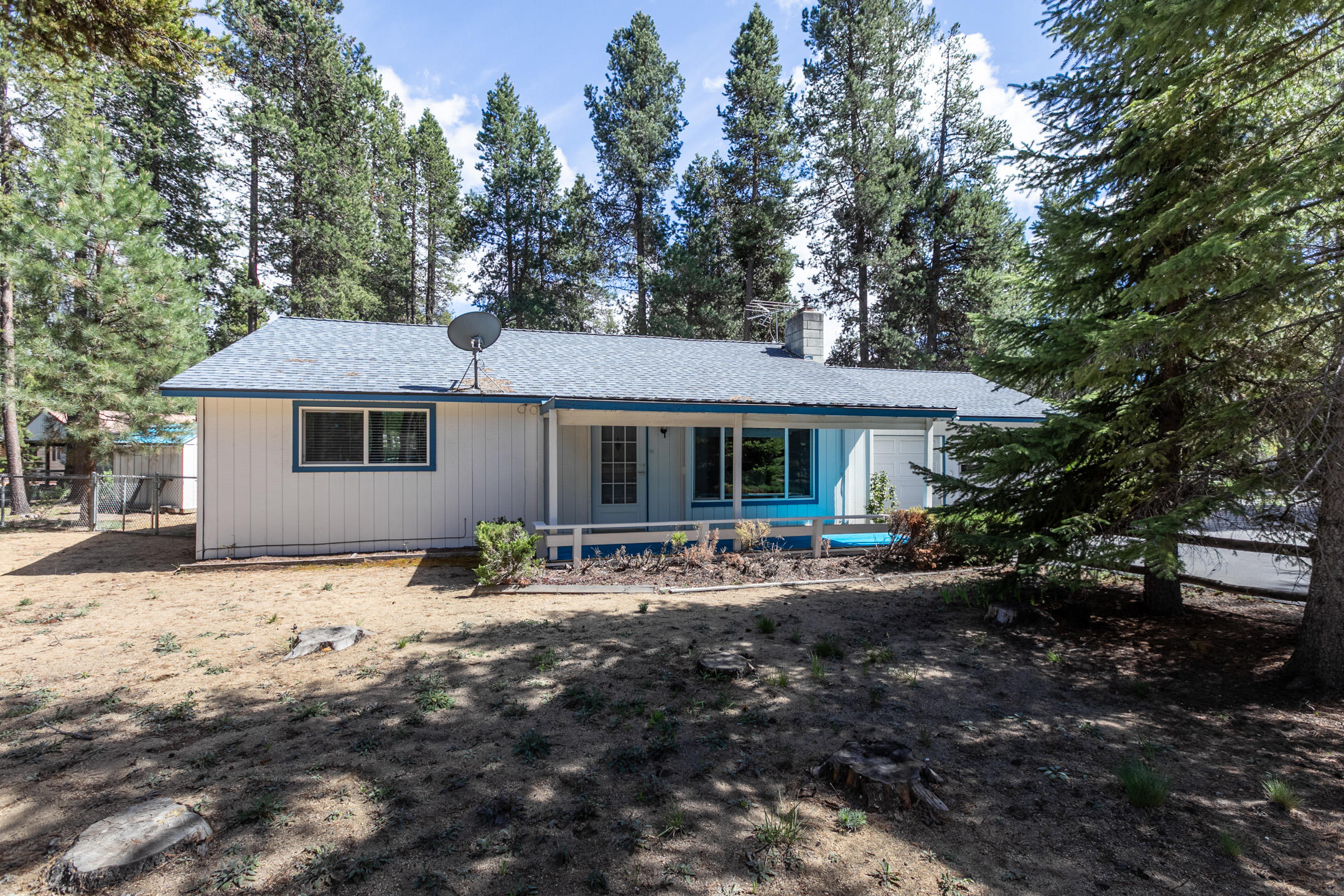 Perfect place to call home in Central Oregon! Cozy 2 bedroom well cared for home w/ a 24x30 shop & a double car garage - this property has it all! Situated just off Burgess on Day Rd w/ a paved circular drive, room to park & RV hookups too.  Open floorplan w/pellet stove insert to keep it toasty all winter & ductless heat pump to keep you cool when summer demands. Spacious bedrooms w/lg closets, one connects to the full bathroom & adjoining laundry. Kitchen offers electric appliances, refrigerator & new dishwasher. Covered front & back porches for year round covered entertaining. Attached double car garage has plenty of storage & door openers. Attached ''mud room'' (not inlcl in sf), along w/2 storage sheds for seasonal decor & gear. Back yard is fenced for pets & family, private well too. Conveniently located near shopping, medical & recreation - all in the heart of Central Oregon!