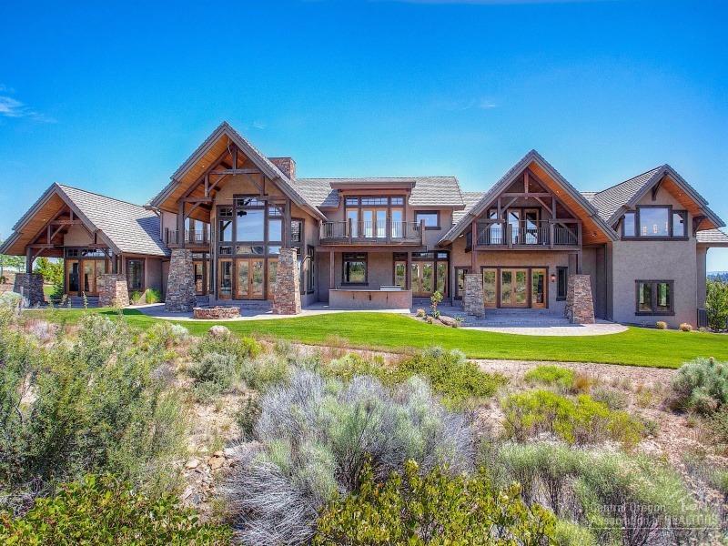 Exquisite estate home in the Highlands at Brokentop. This architectural marvel contains 10,000 sq ft of custom craftsmanship on 11 acres bordering the Deschutes National Forest. Soaring floor-to-ceiling chiseled ledgestone fireplace framed by massive handcrafted timber beams. Custom ironwork, Italian marble, Calais stone, Venetian plaster & custom artisan woodwork throughout. Wine cellar, theater, nanny quarters, gourmet kitchen, spectacular Cascade Mountain views. Private & secluded.