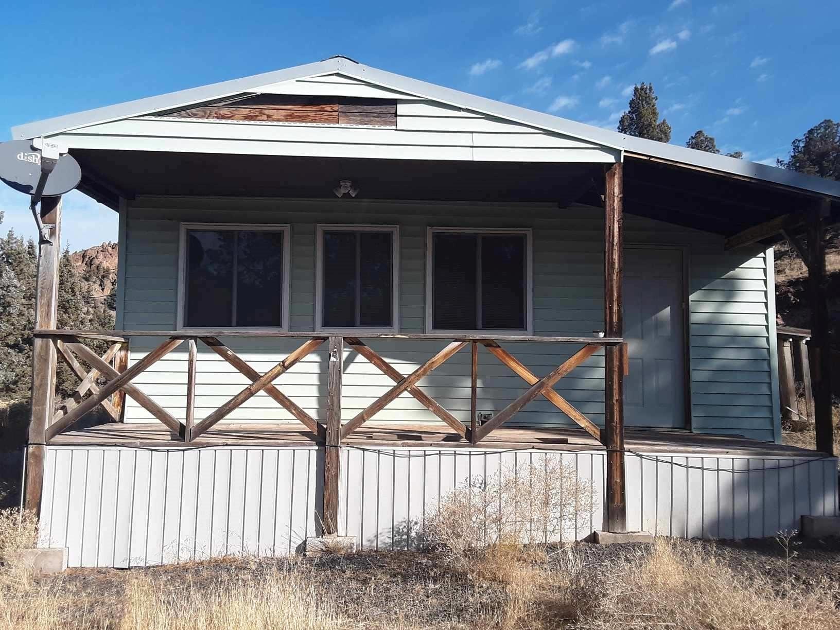 This 2 bed/1bath darling stick built cottage with so much potential, sits on 1.14 acres! There are breathtaking views from nearly every angle you look! AND just a short drive to the reservoir for fun and adventures.